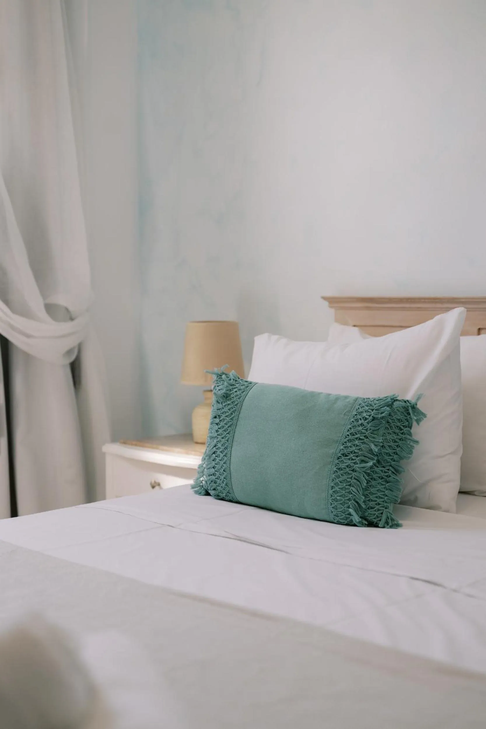 Bed in Lindos Harmony Suites