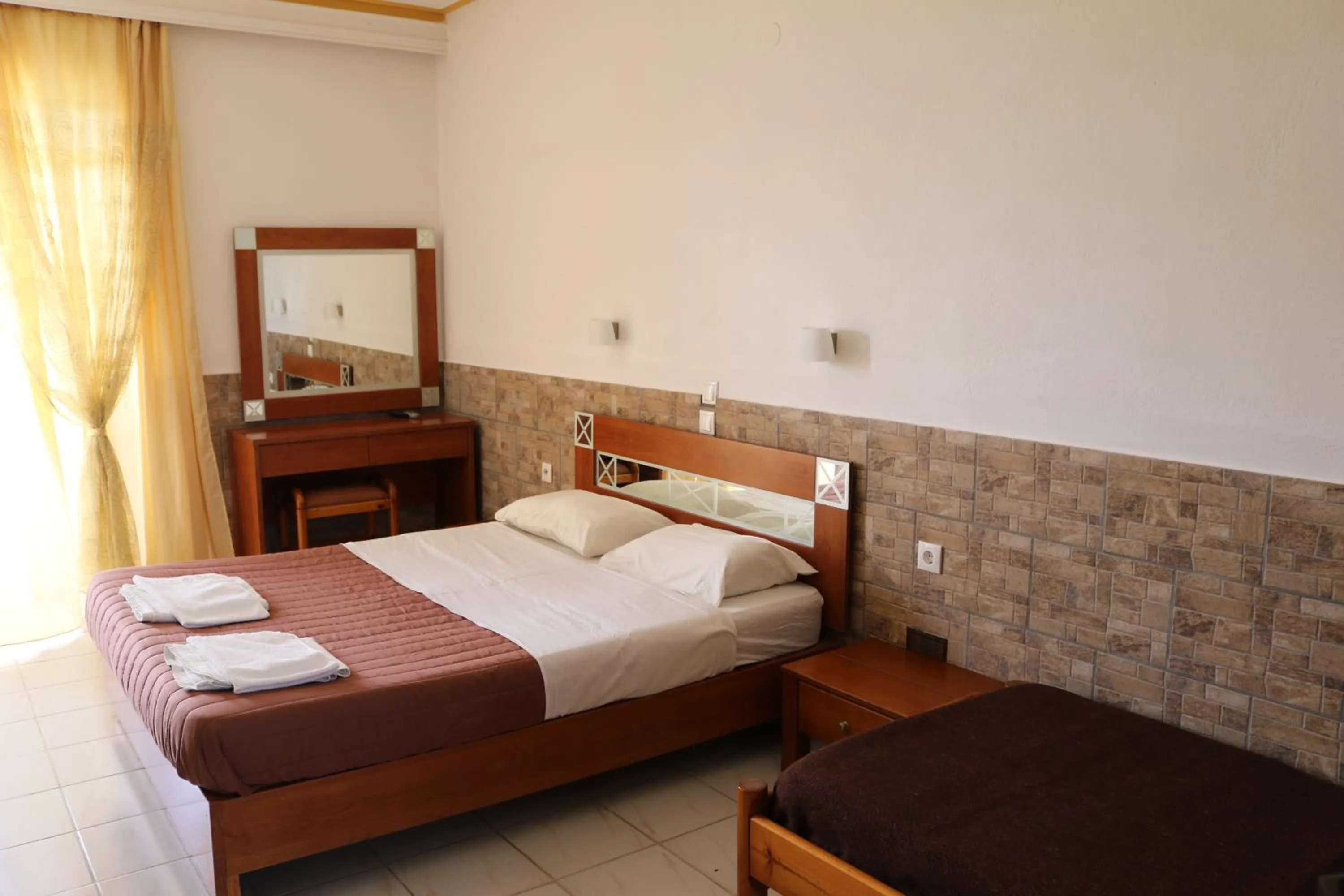 Photo of the whole room, Bed in Golden Sun