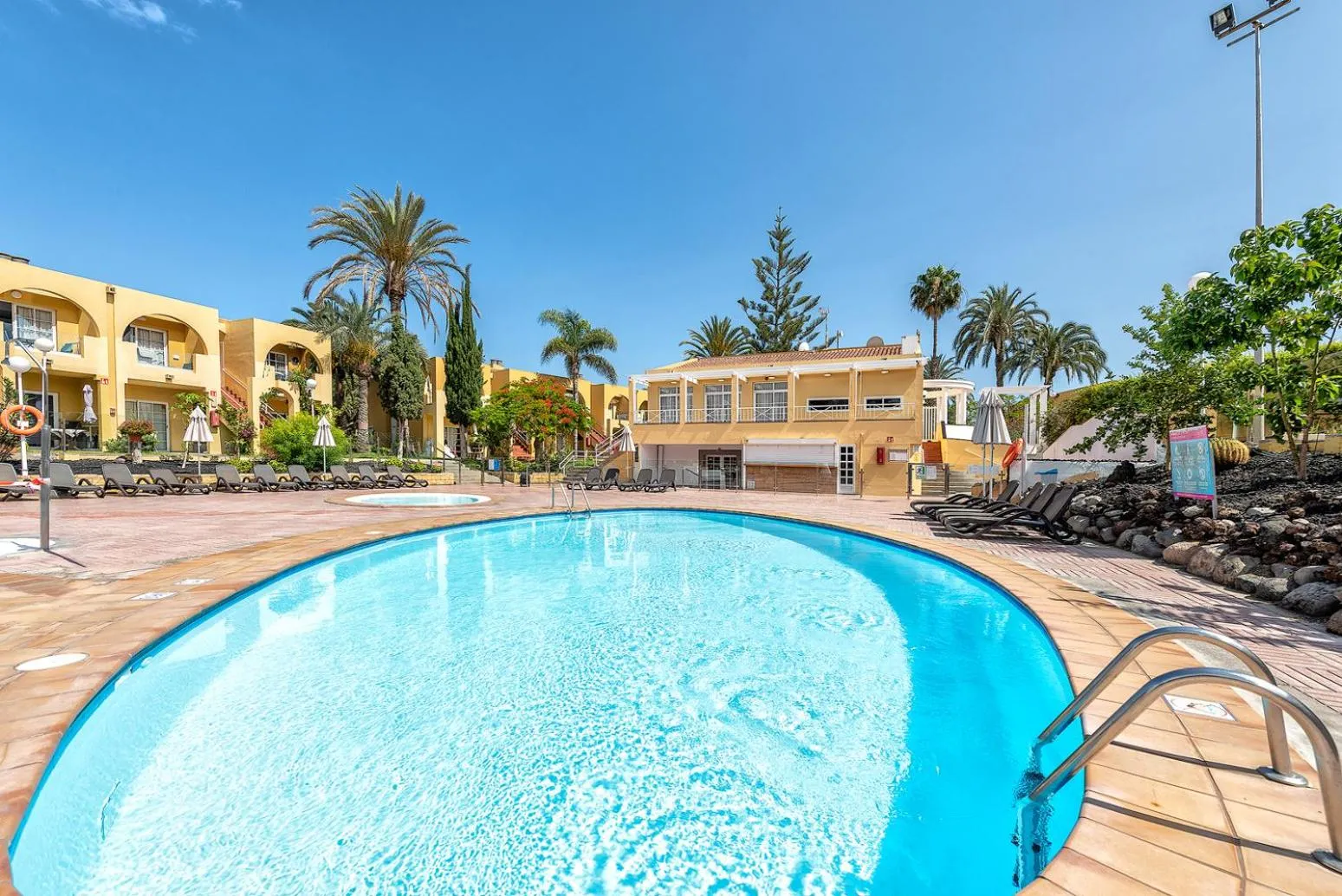 Swimming pool in Tisalaya Bright Apartment