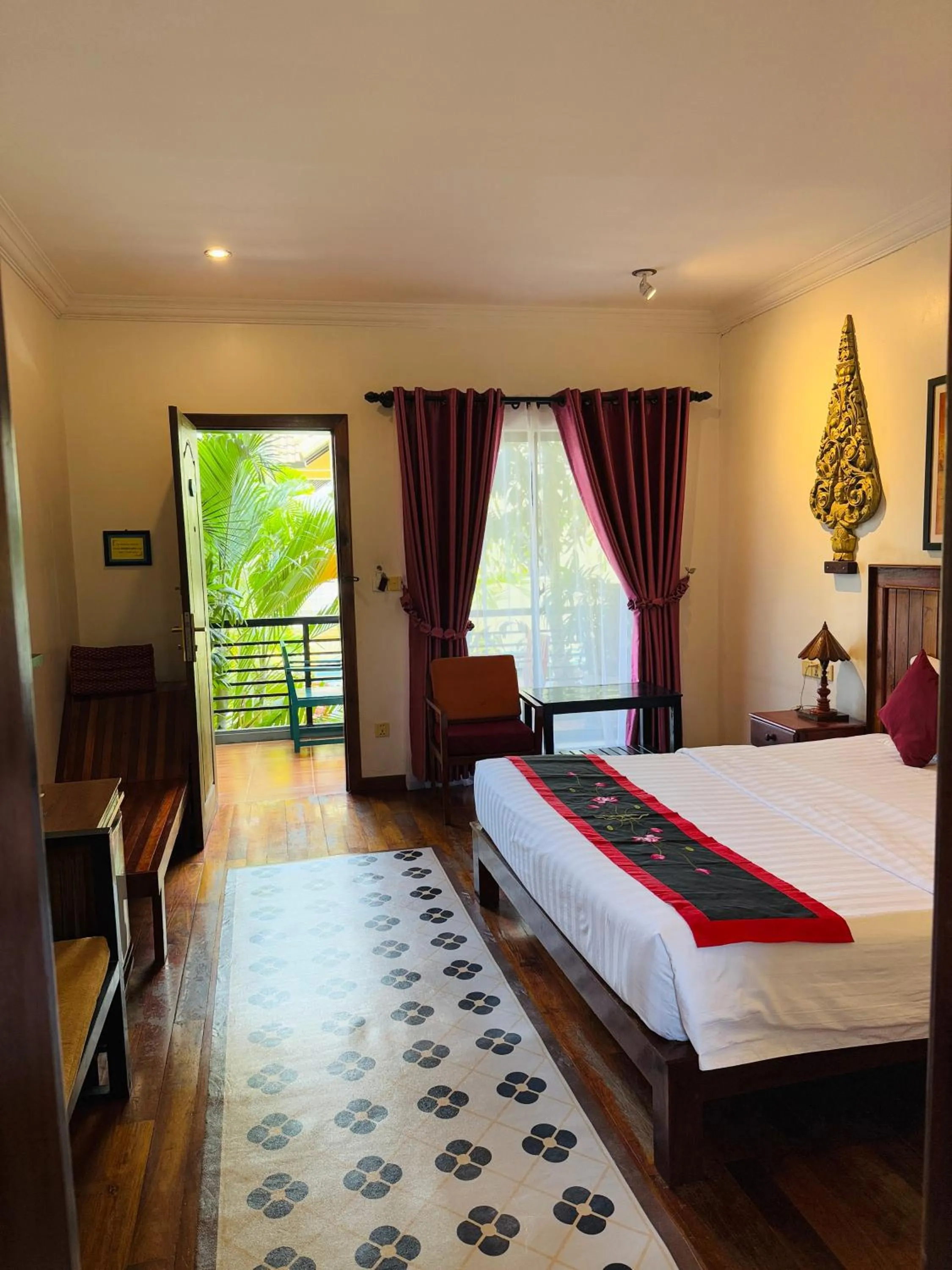 Bed in Asanak D'Angkor Boutique Hotel