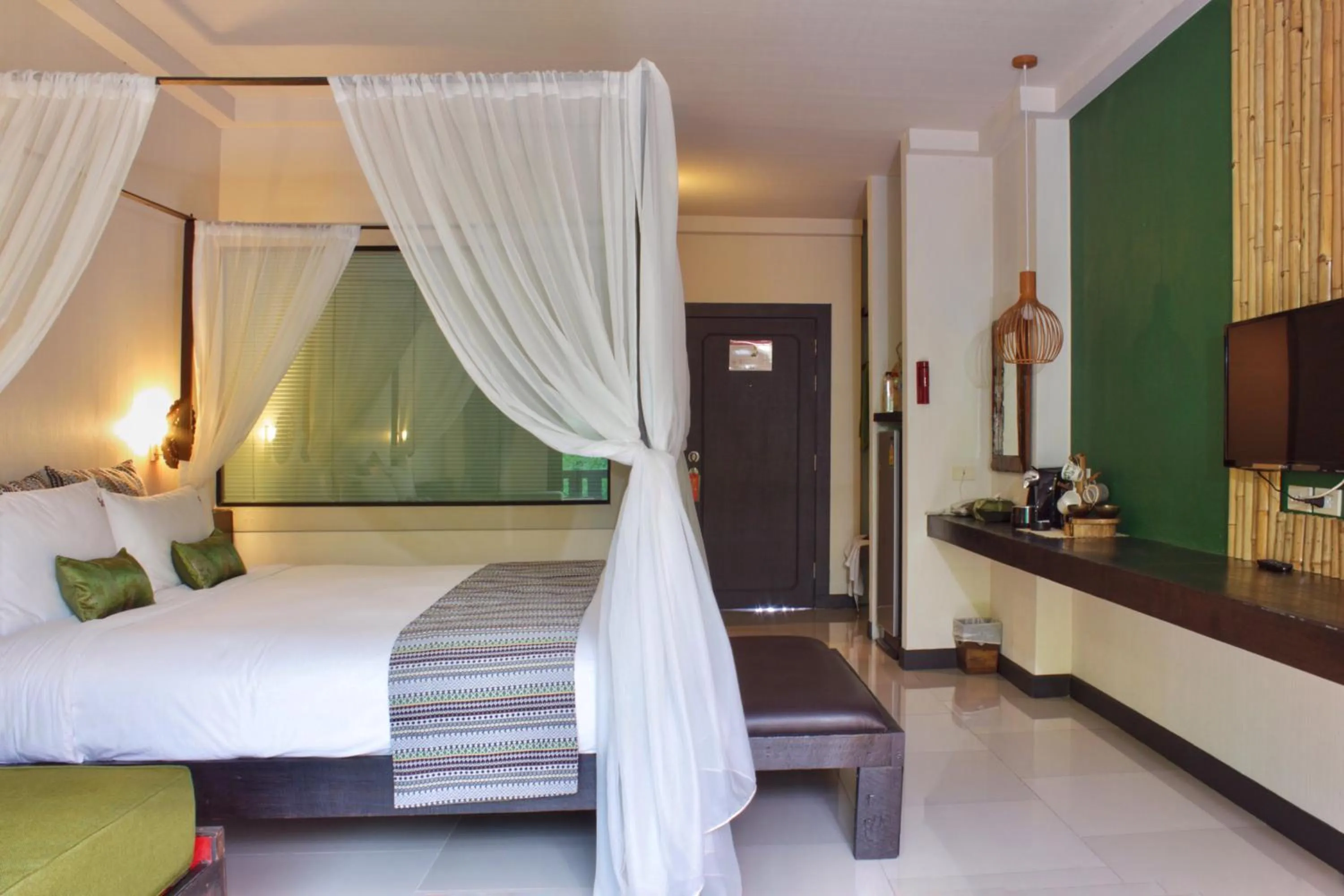 TV and multimedia, Bed in Bamboori Boutique Resort