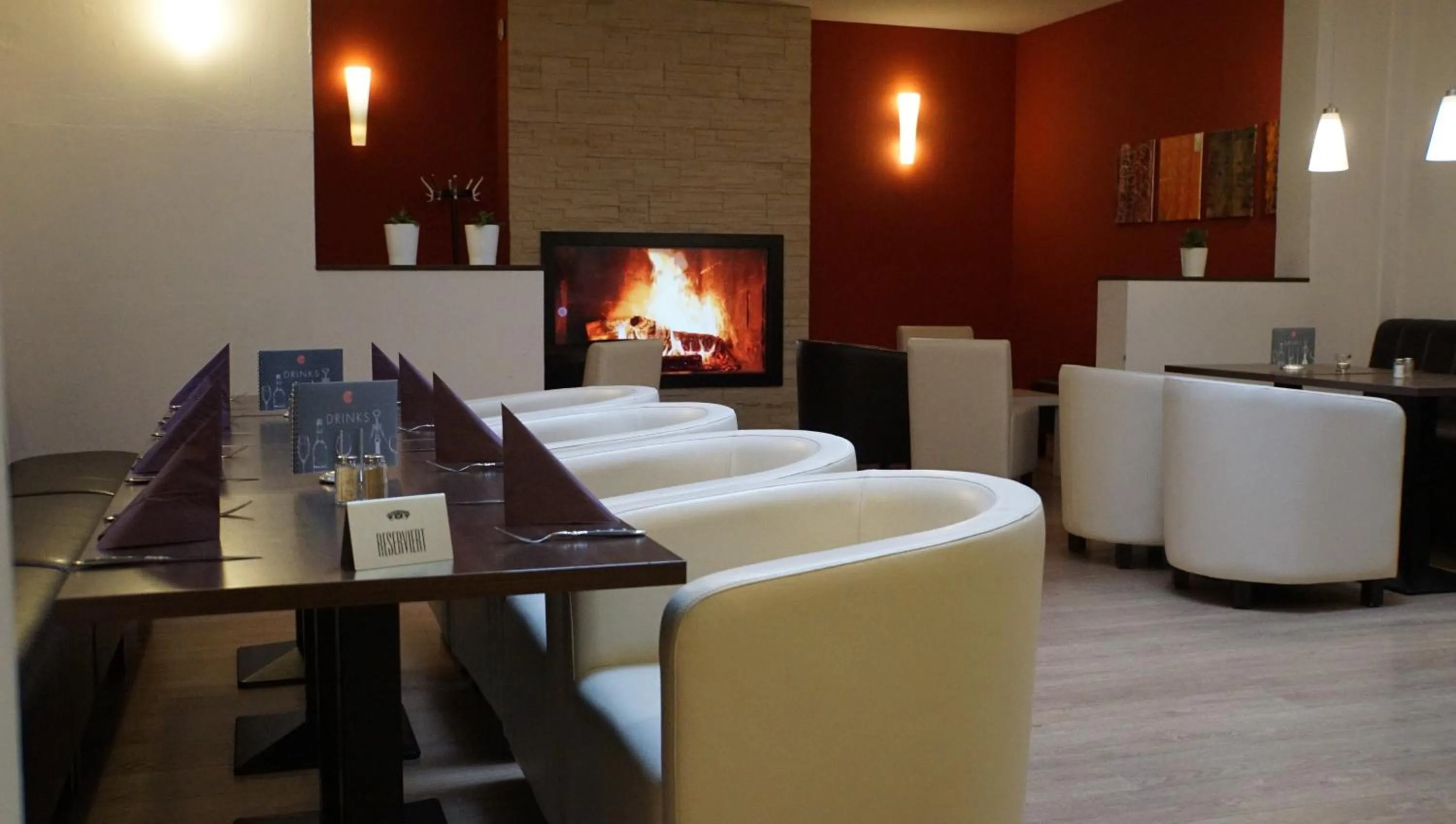 Communal lounge/ TV room in Sporthotel Neuruppin - Apartmenthaus mit Ferienwohnungen
