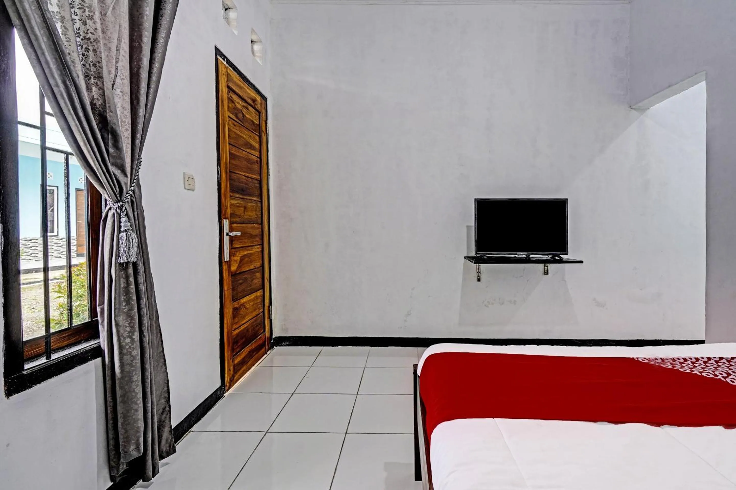Bedroom, Bed in OYO 91334 Permata Papua Guest House