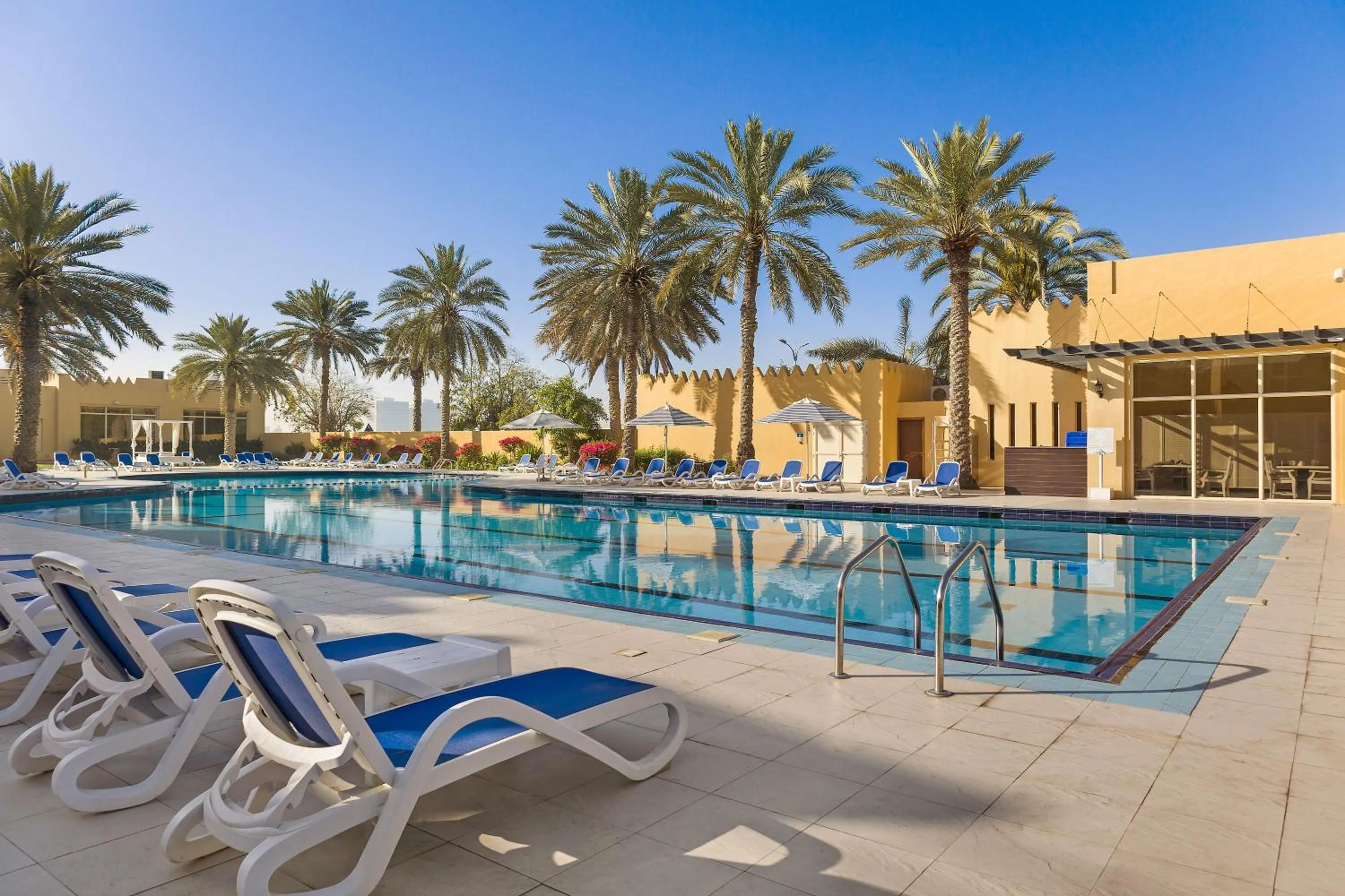 Swimming pool in Al Hamra Village Hotel