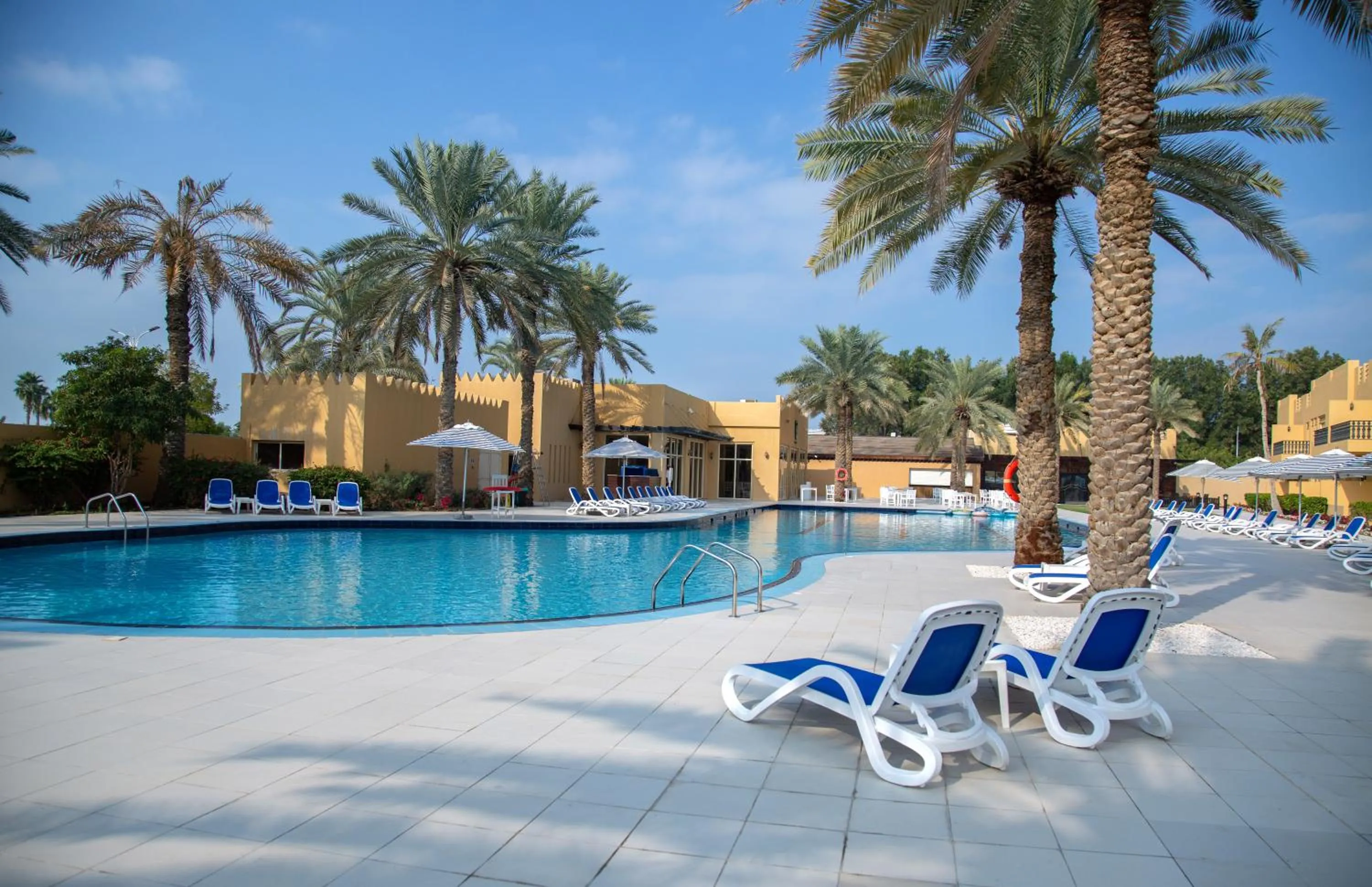 Swimming pool in Al Hamra Village Hotel