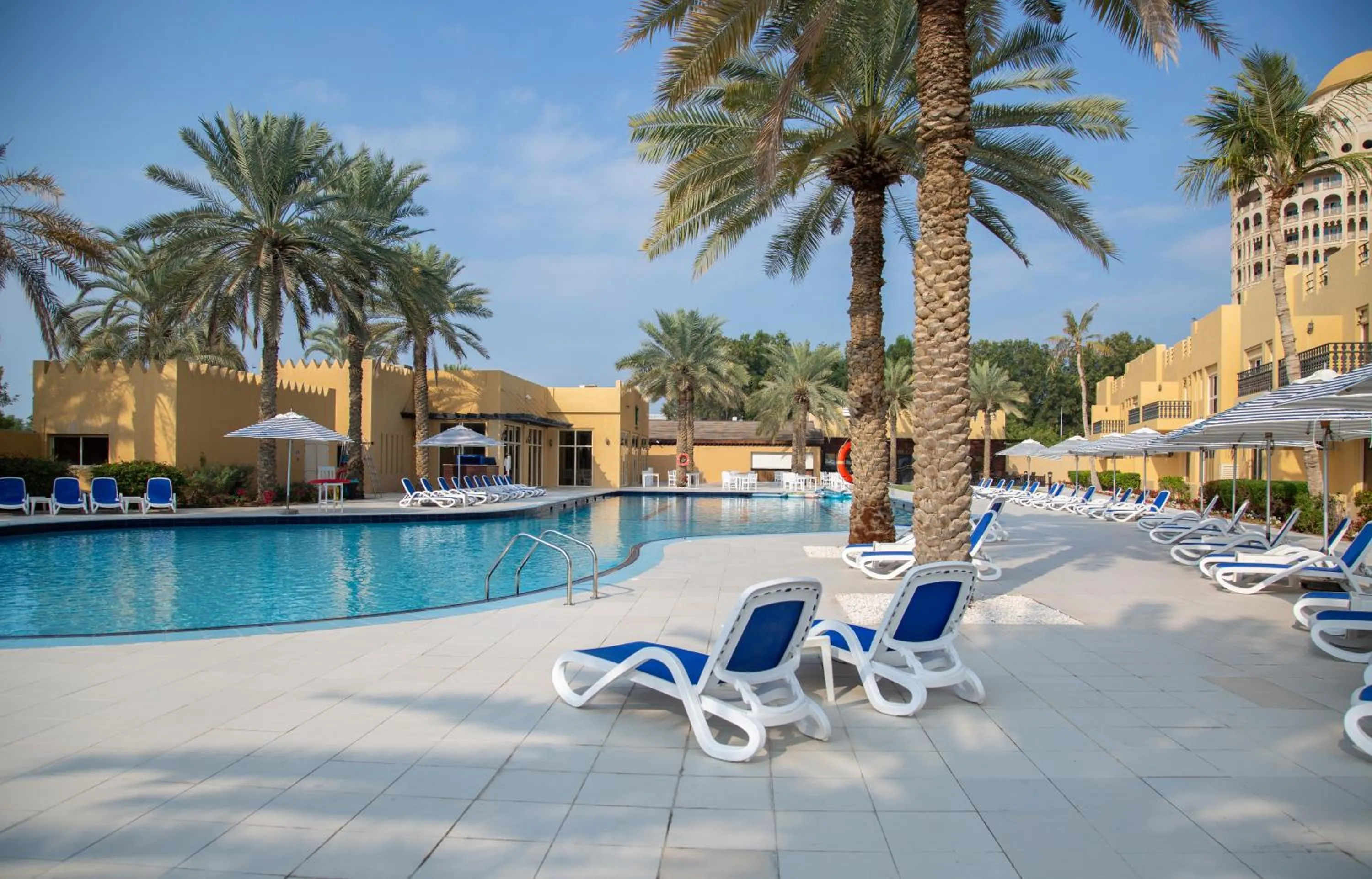 Swimming pool in Al Hamra Village Hotel