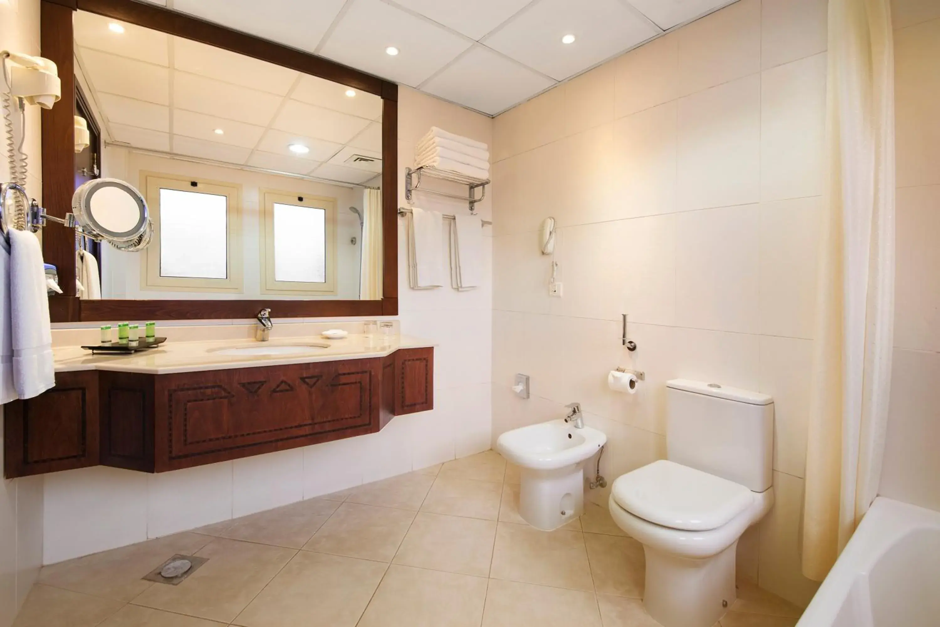 Bathroom in Al Hamra Village Hotel Bathroom in Al Hamra Village Hotel