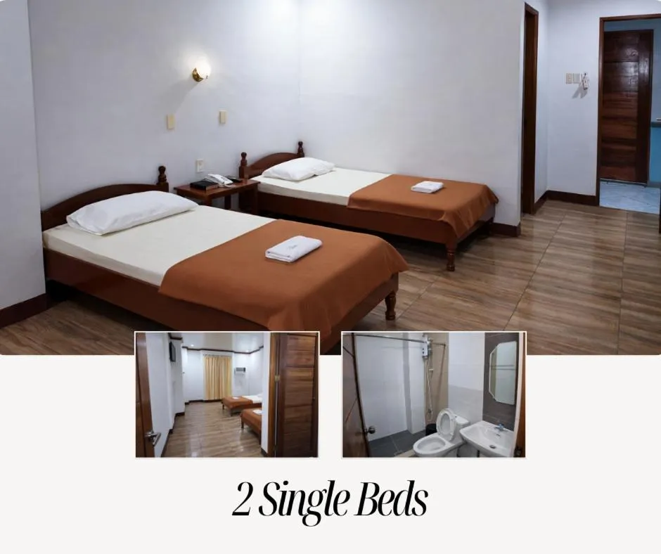 Bed in La Elliana Hotel & Restaurant, Inc.