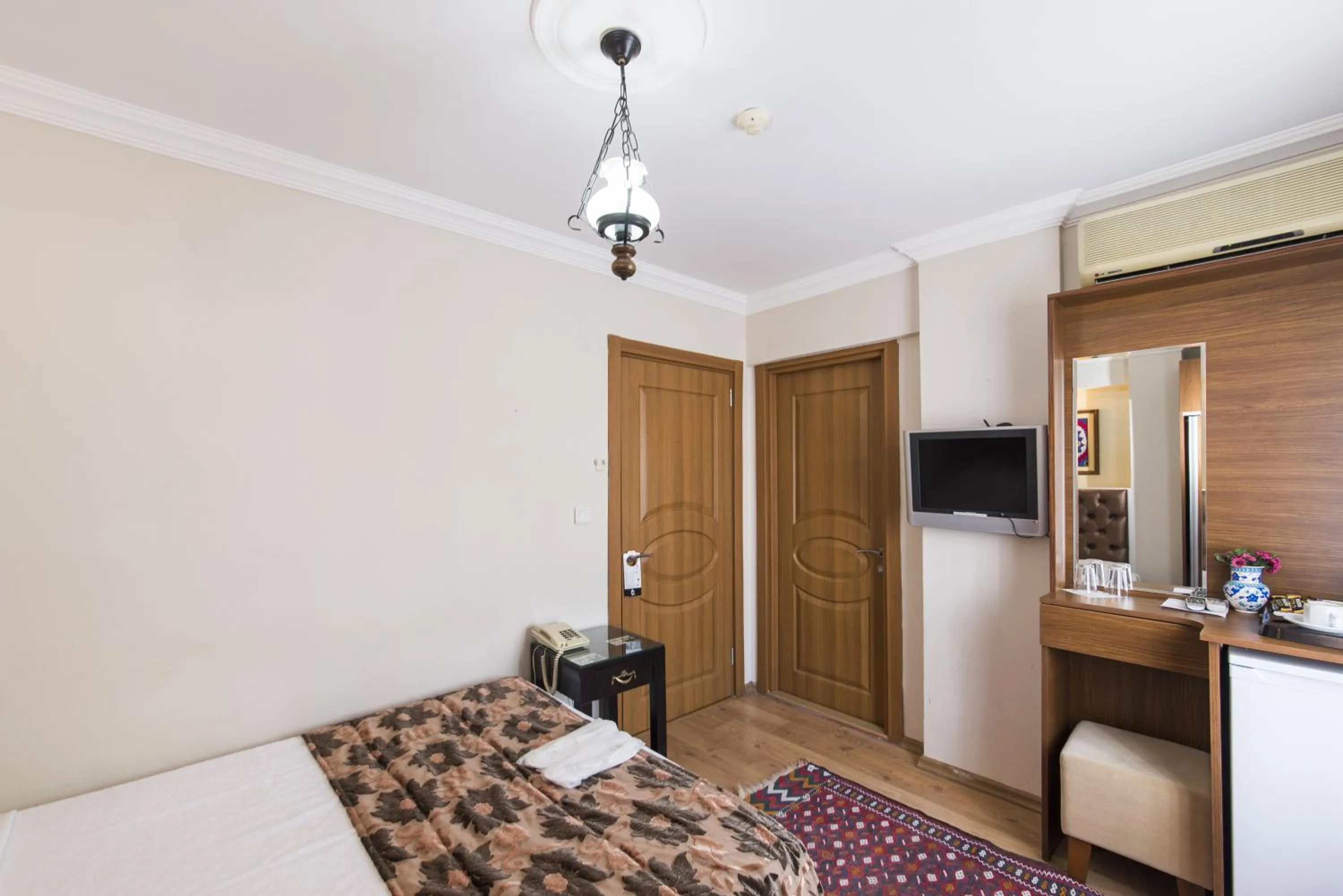 Decorative detail, TV/Entertainment Center in Sultan's Inn