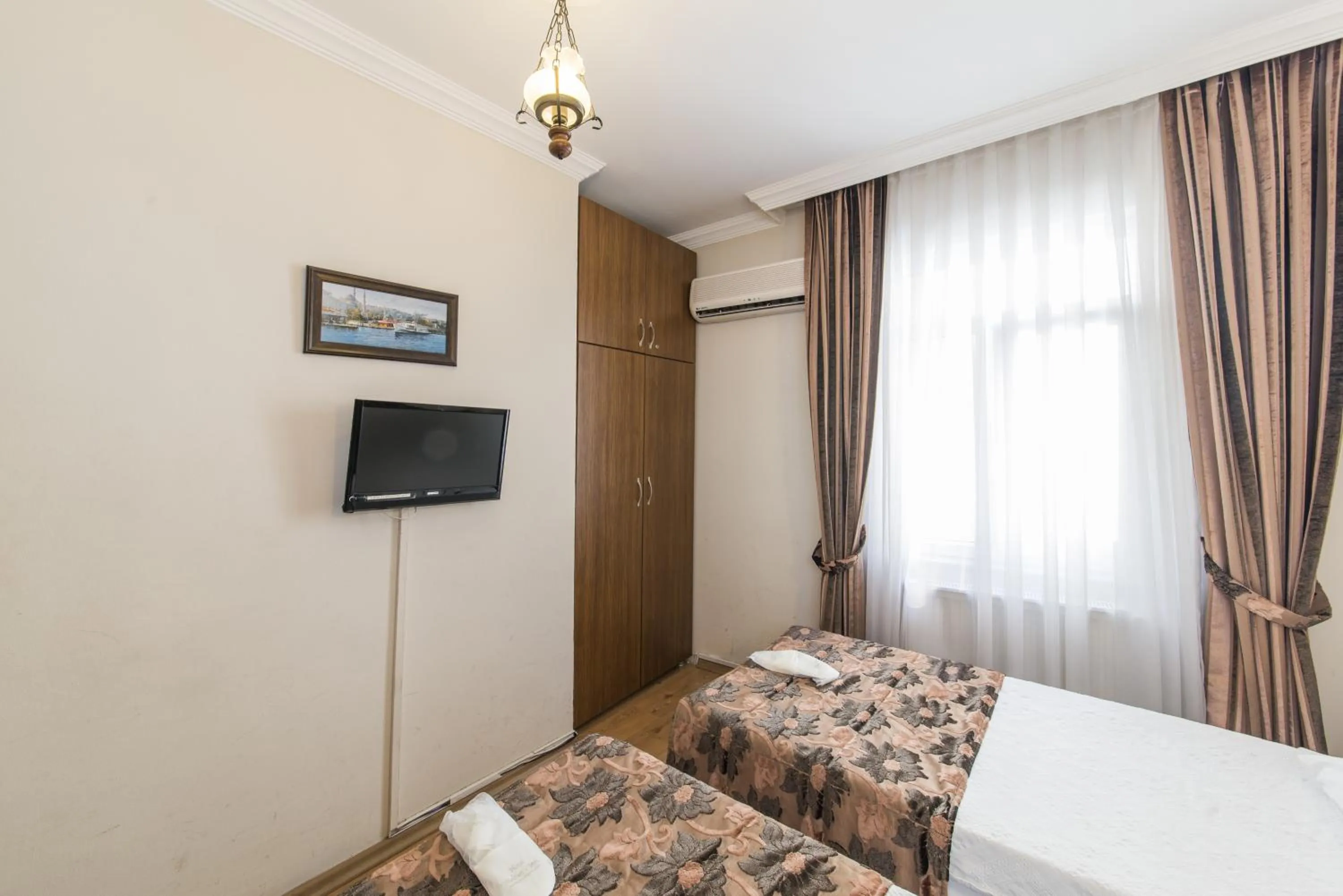 Decorative detail, TV/Entertainment Center in Sultan's Inn