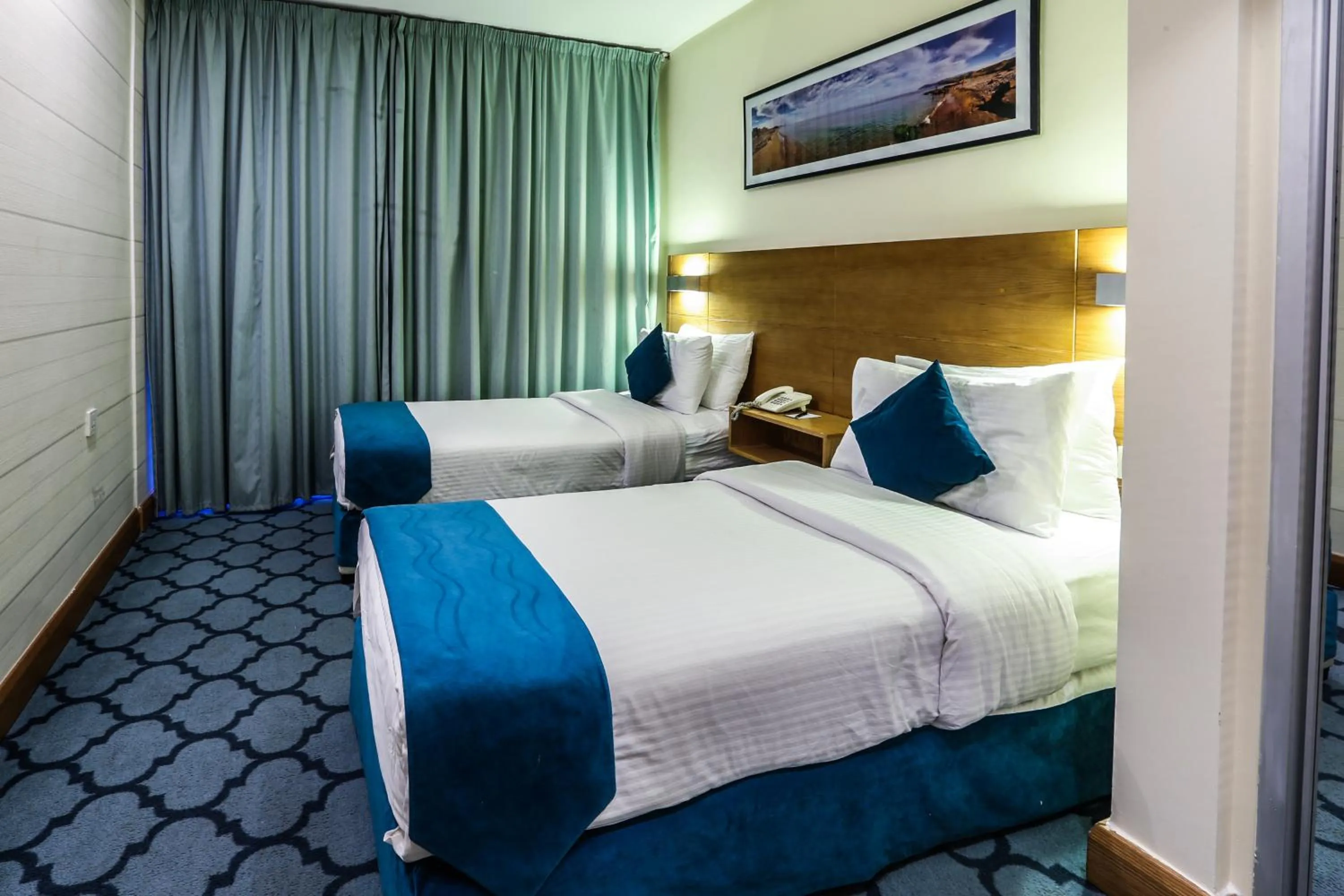 Bed in Khuttar Apartment