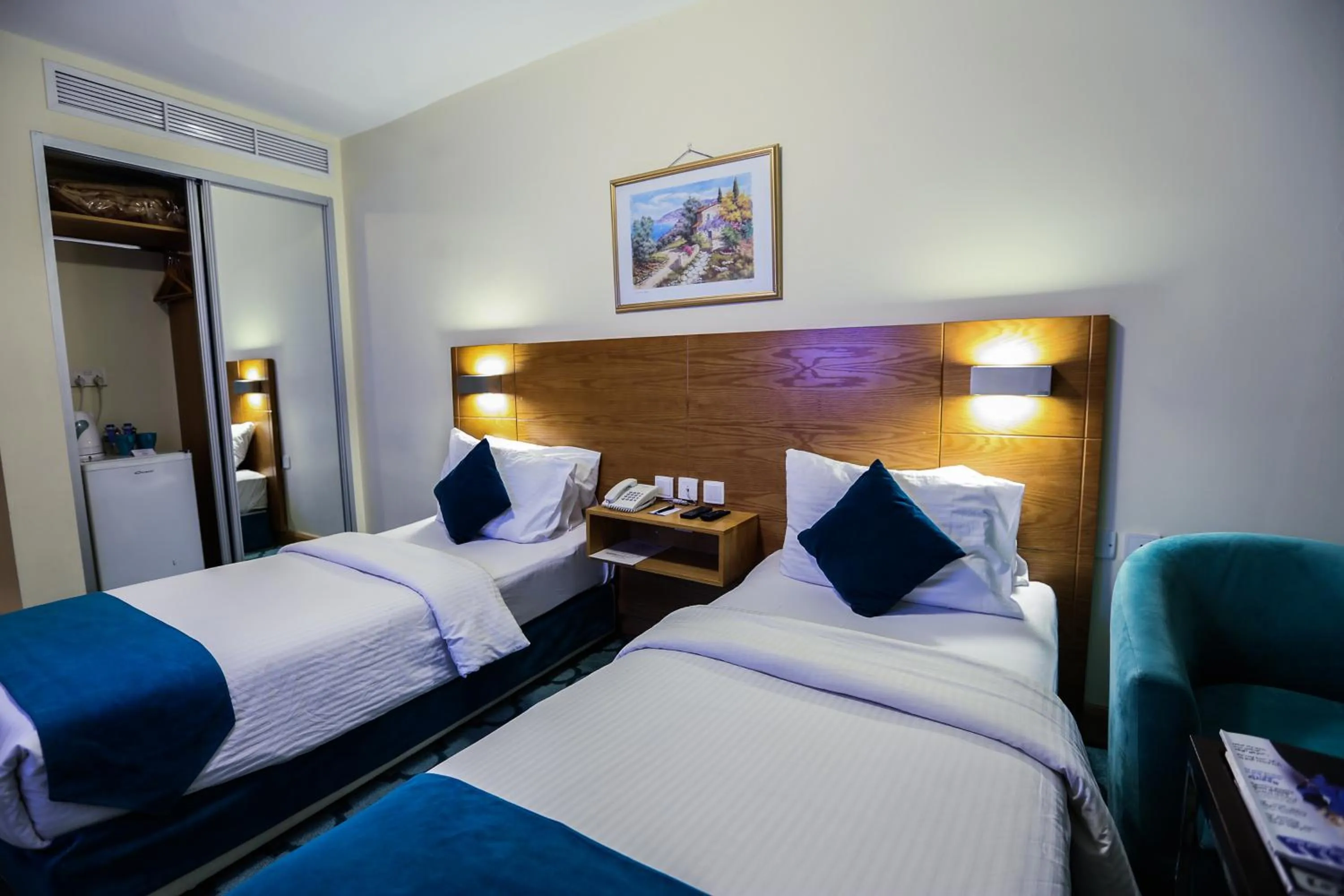 Bed in Khuttar Apartment