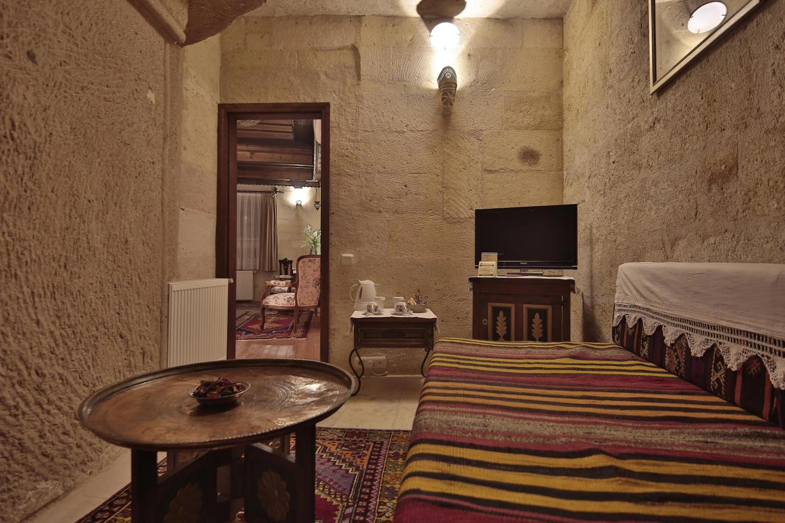 Seating area, Bed in Selcuklu Evi Cave Hotel - Special Category