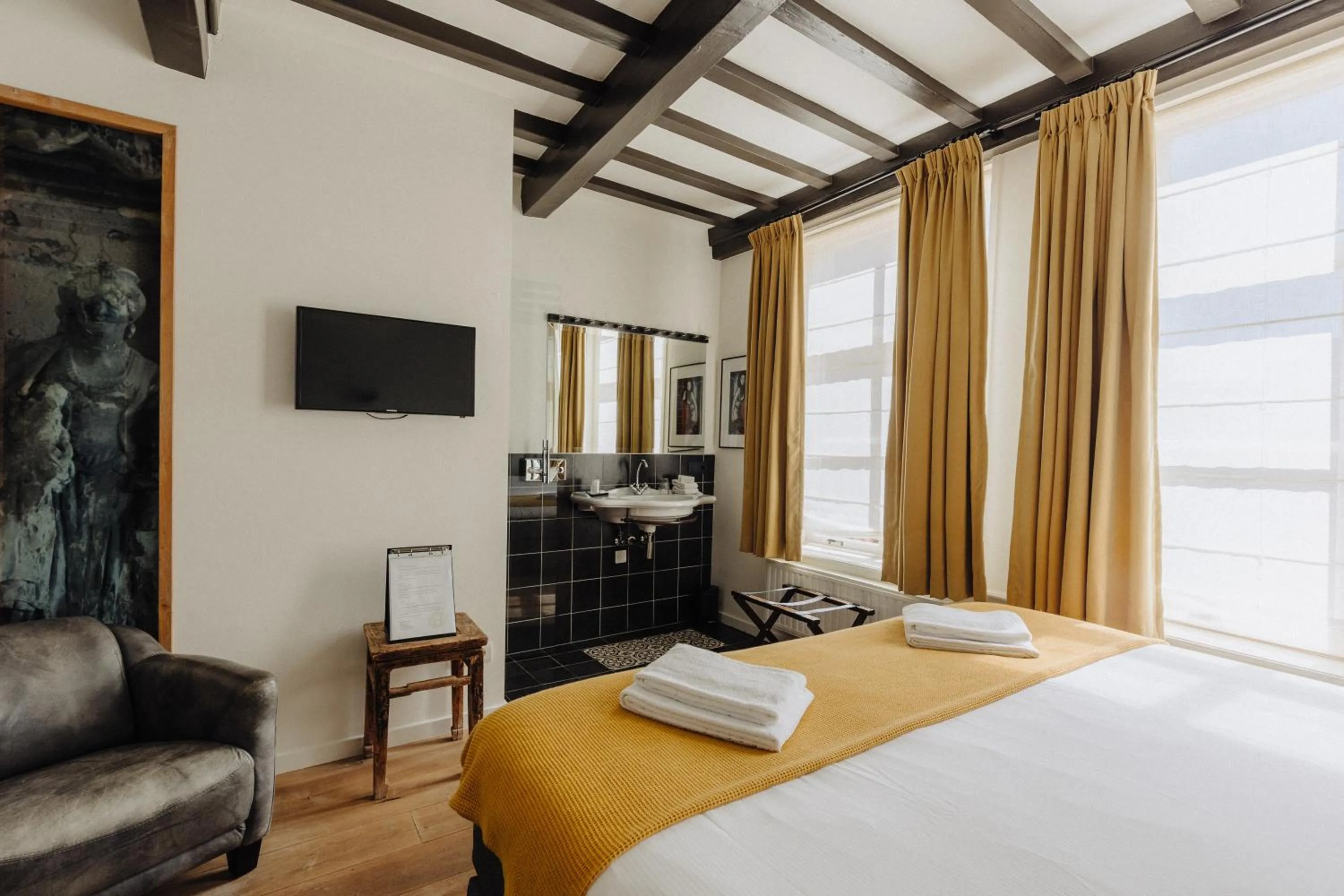 Bed in Hotel De Heeren