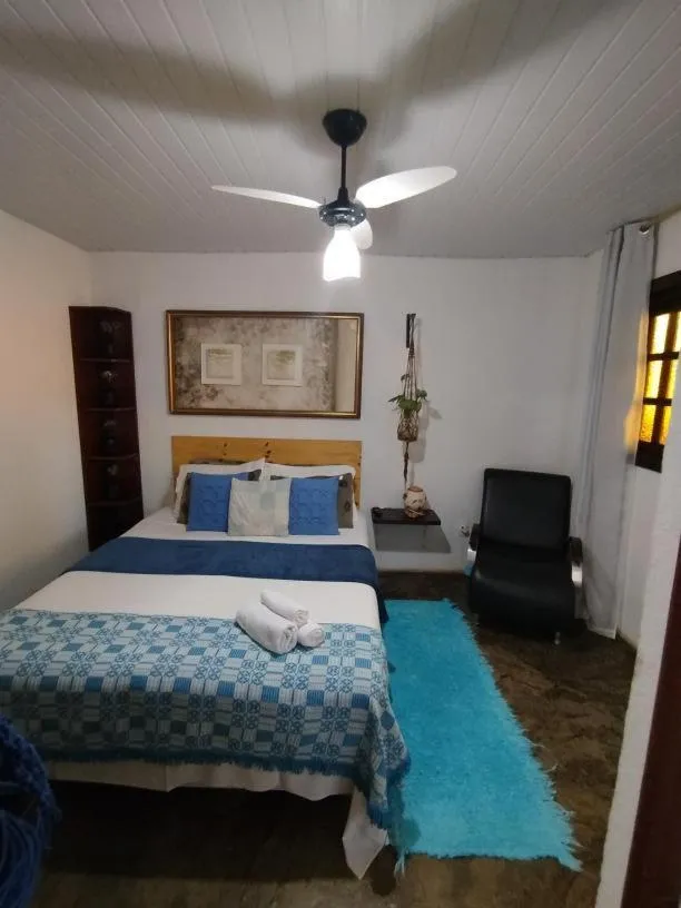 Bed in Pousada Recanto dos Leões