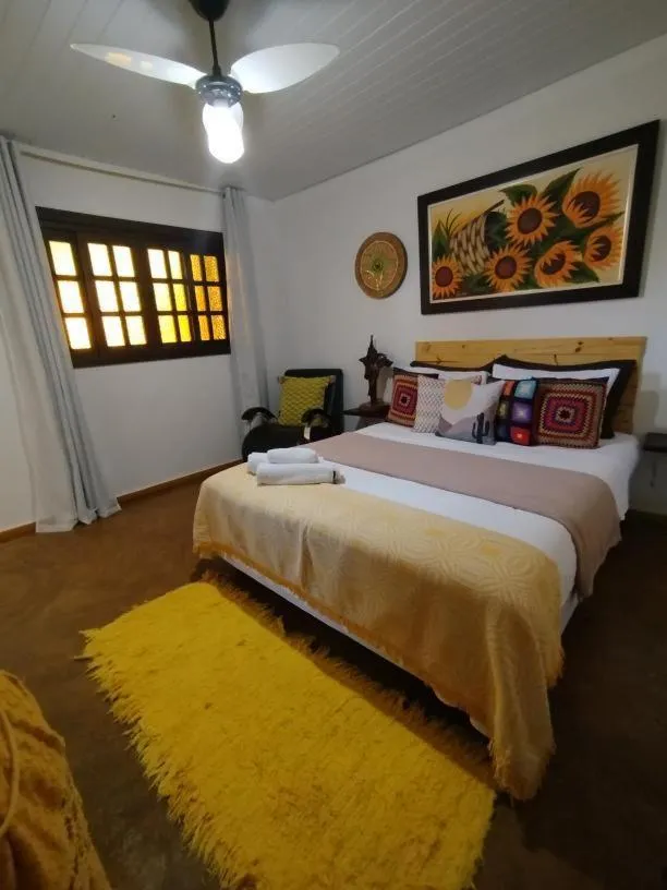 Bed in Pousada Recanto dos Leões