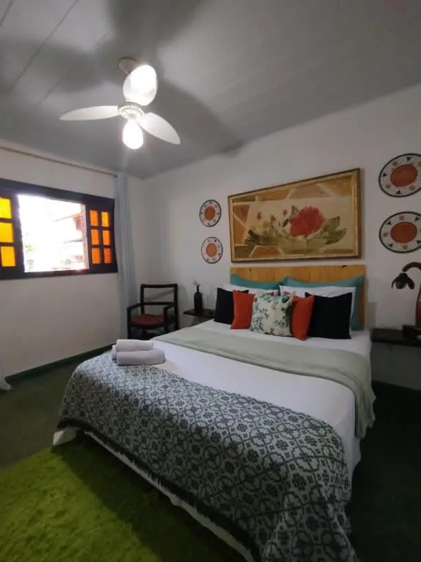 Bed in Pousada Recanto dos Leões