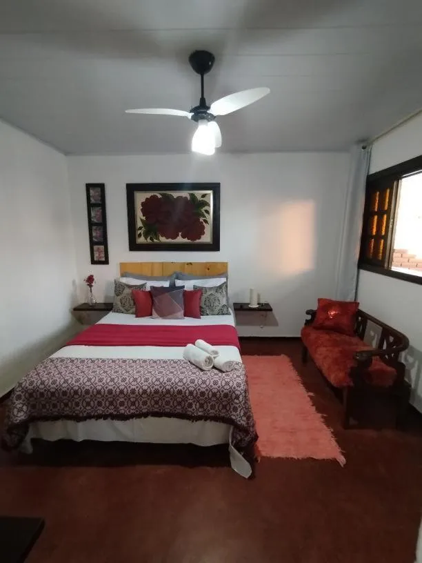 Bed in Pousada Recanto dos Leões