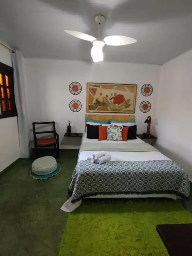 Bed in Pousada Recanto dos Leões