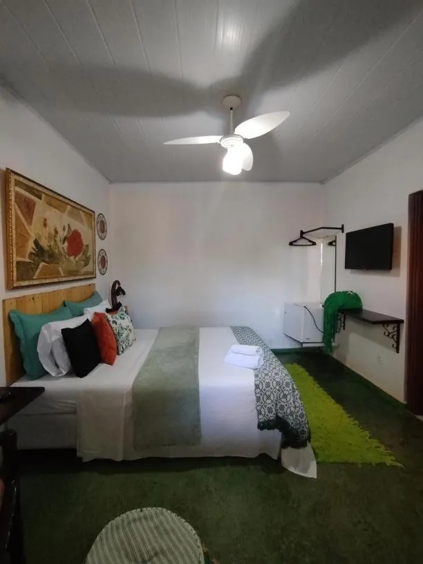Bed in Pousada Recanto dos Leões