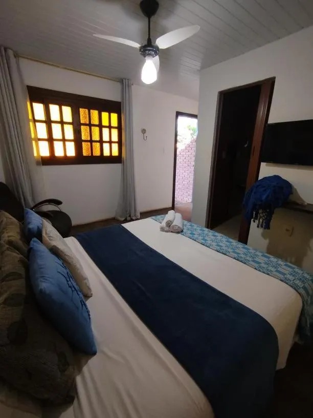 Bed in Pousada Recanto dos Leões