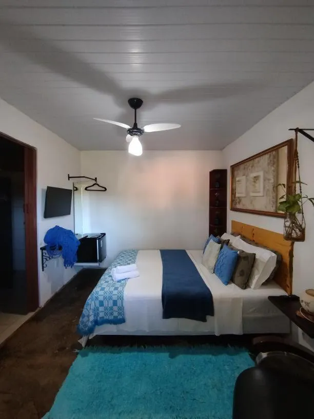 Bed in Pousada Recanto dos Leões