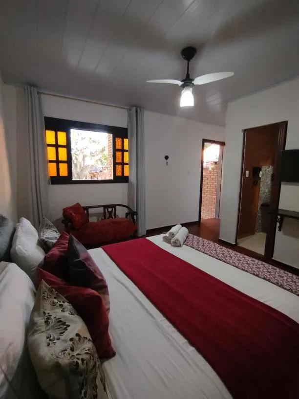 Bed in Pousada Recanto dos Leões