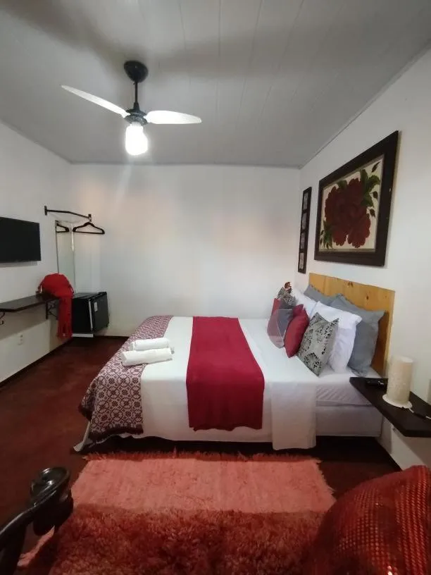 Bed in Pousada Recanto dos Leões