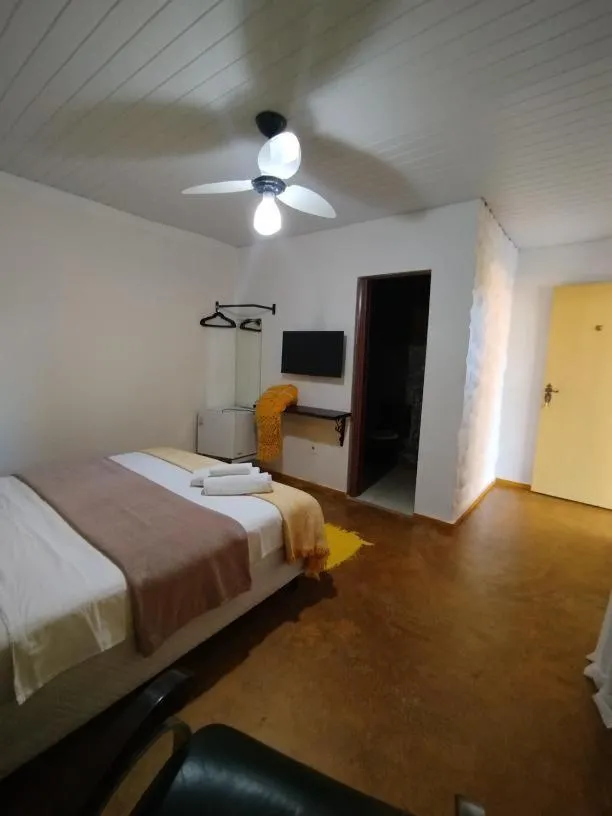 Bed in Pousada Recanto dos Leões