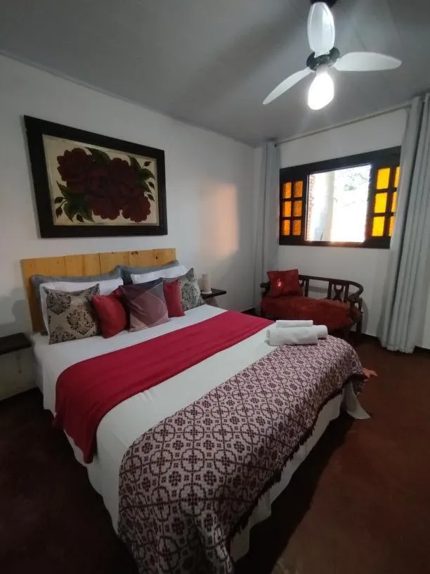 Bed in Pousada Recanto dos Leões