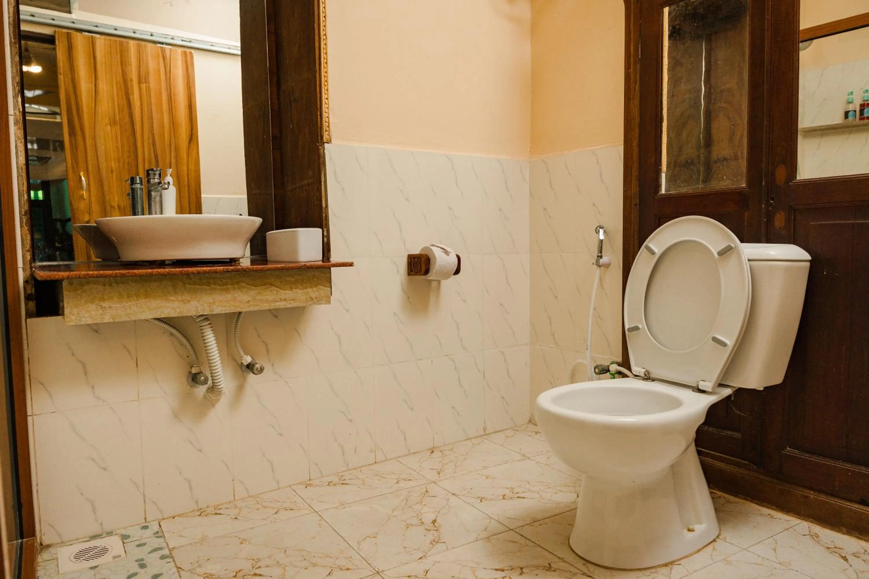 Toilet in Emerald Palm Boutique Hotel