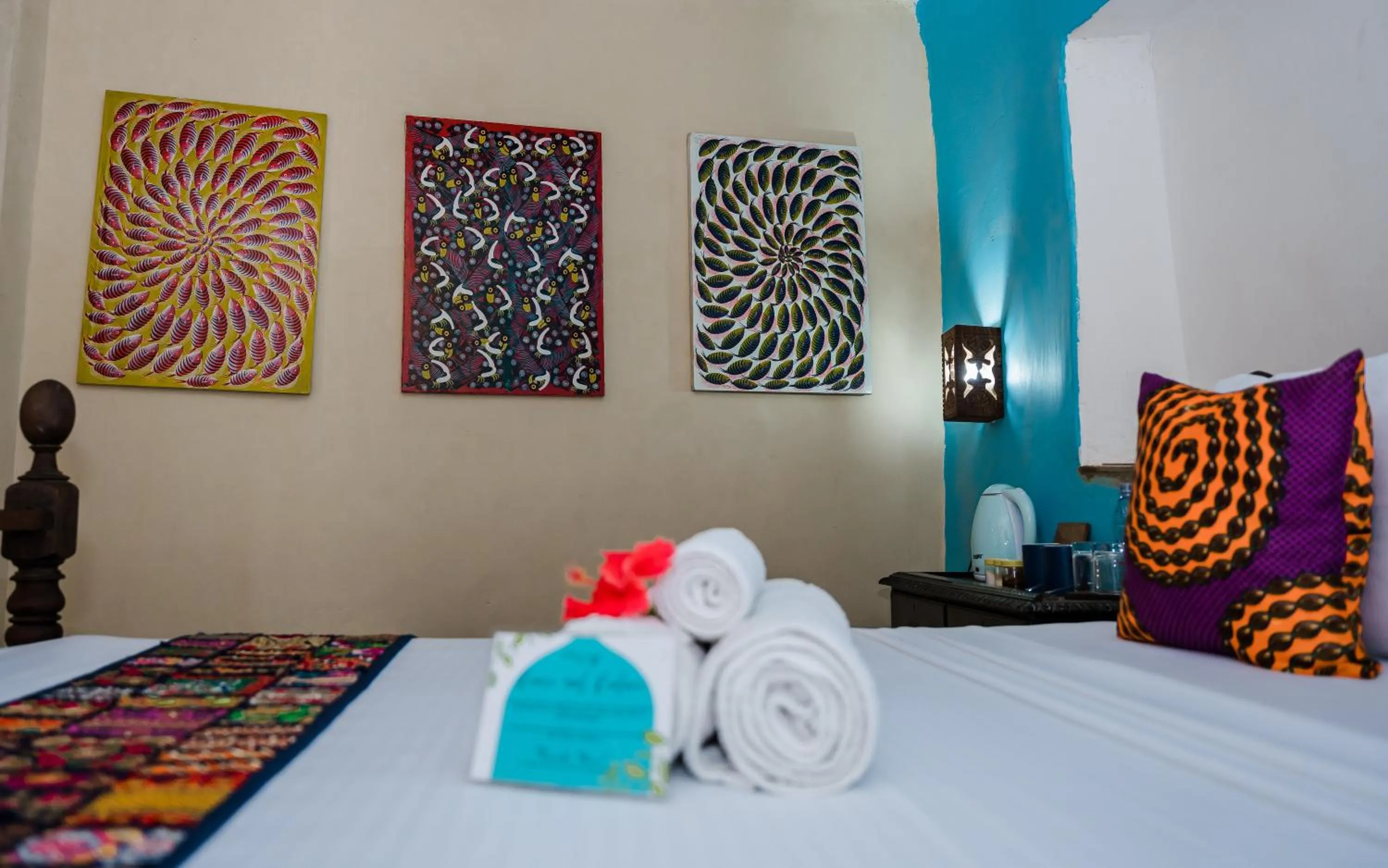 Bed in Emerald Palm Boutique Hotel