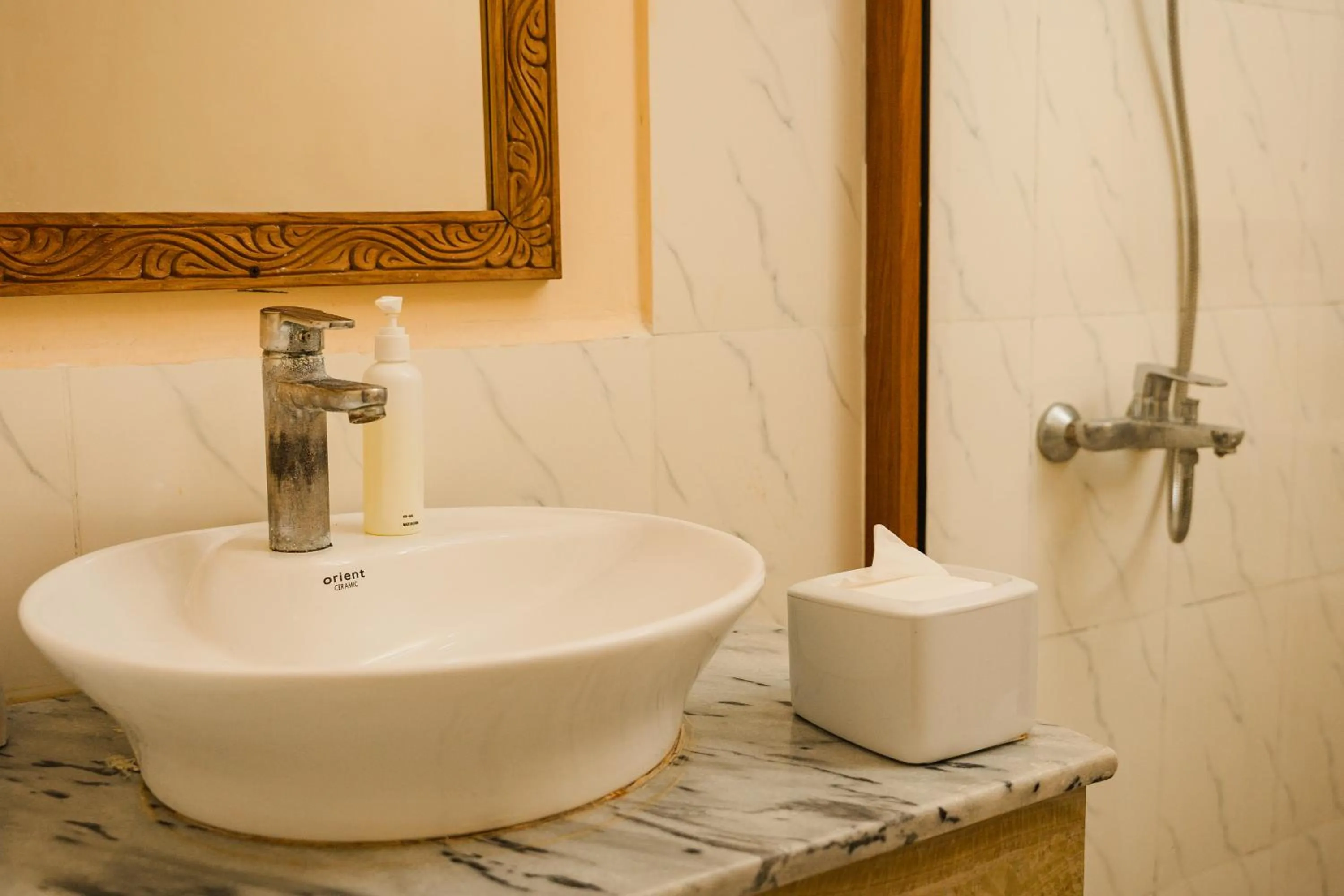 Toilet in Emerald Palm Boutique Hotel