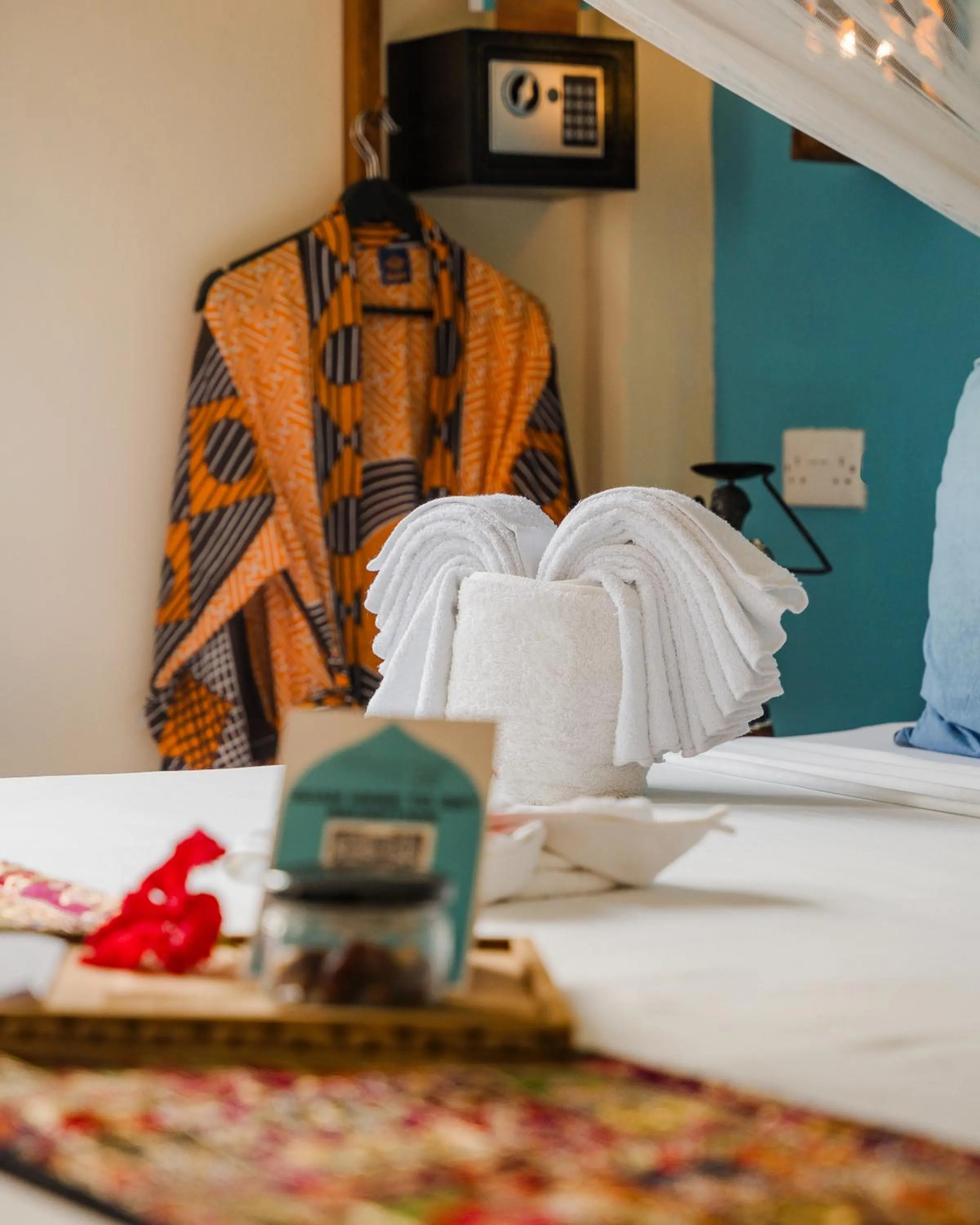 Bed in Emerald Palm Boutique Hotel