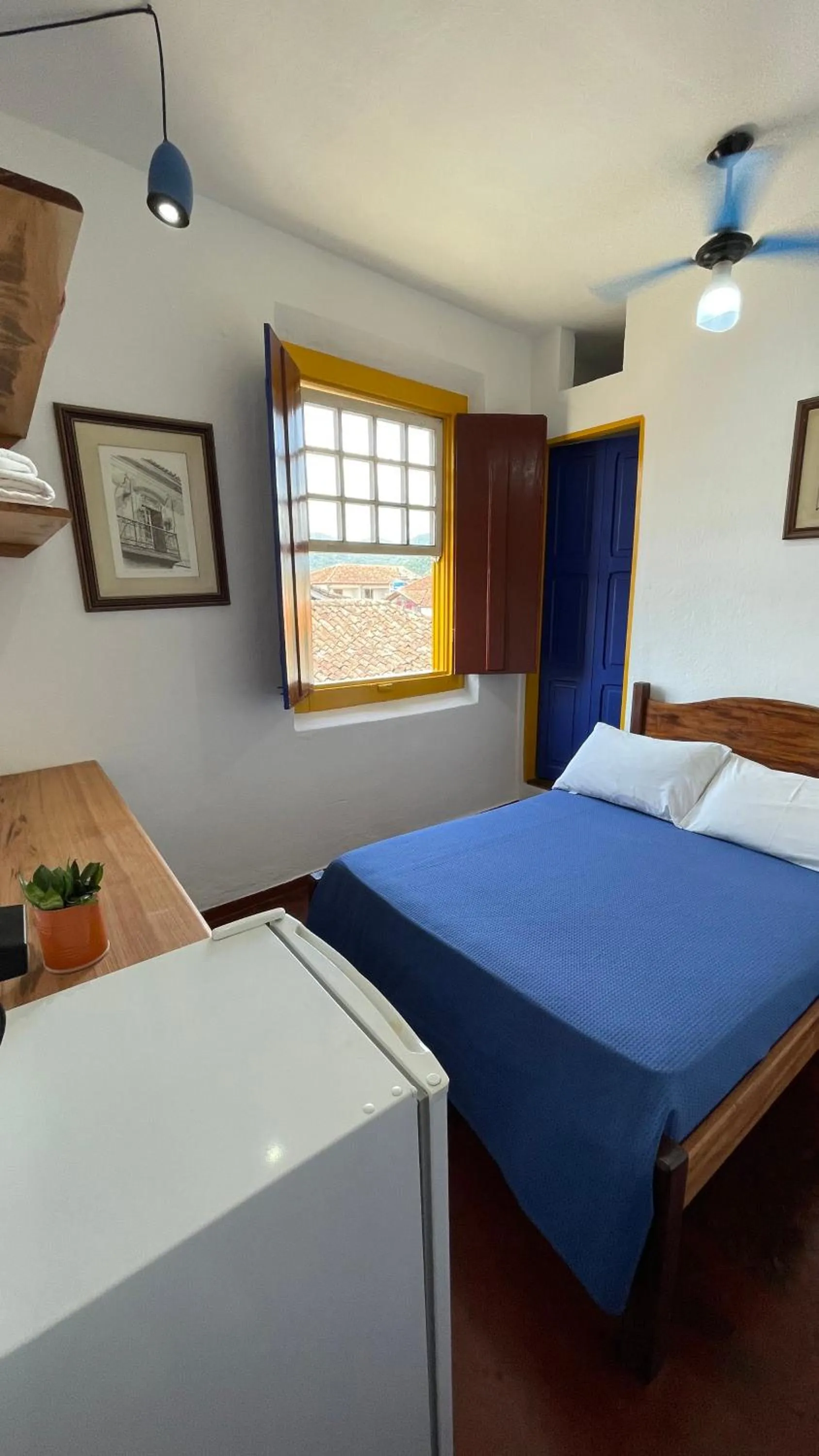 Photo of the whole room, Bed in Café e Prosa Centro Histórico