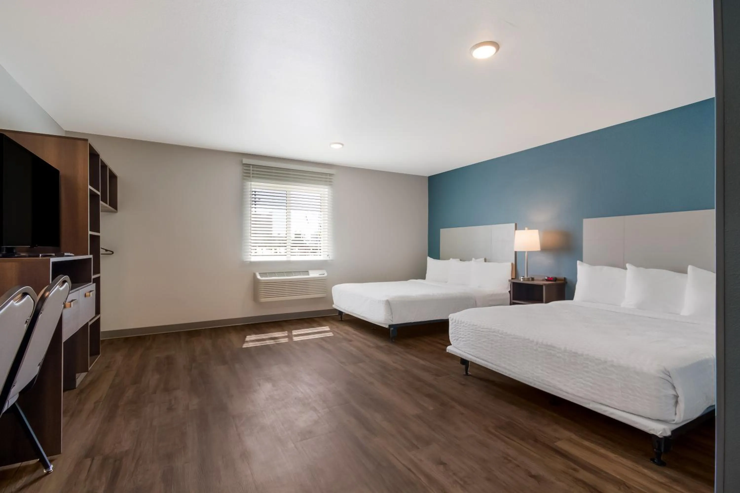 Photo of the whole room, Bed in WoodSpring Suites Panama City Beach