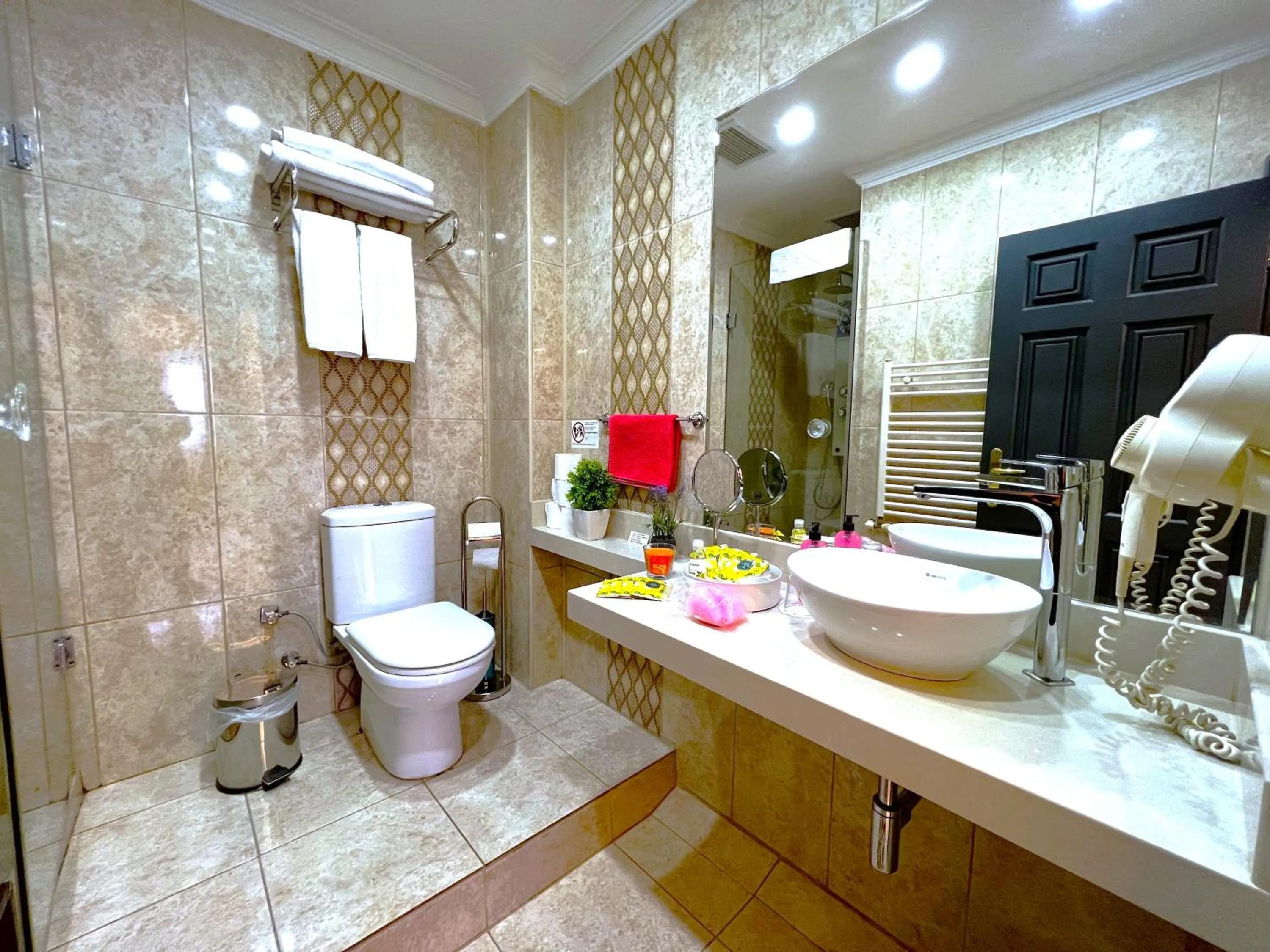 Shower in Angel's Home Hotel - Angel Group Hotels