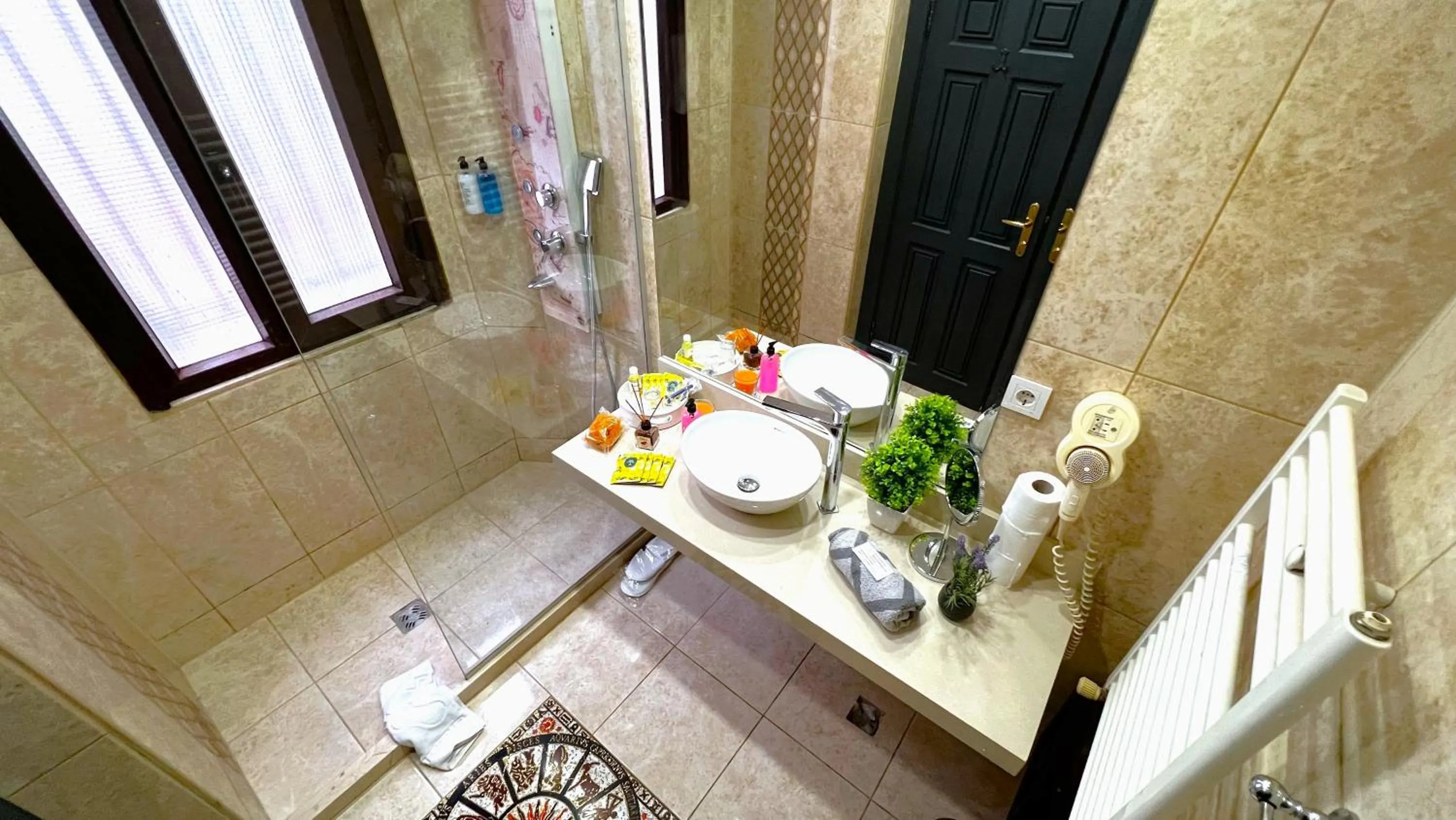 Shower in Angel's Home Hotel - Angel Group Hotels