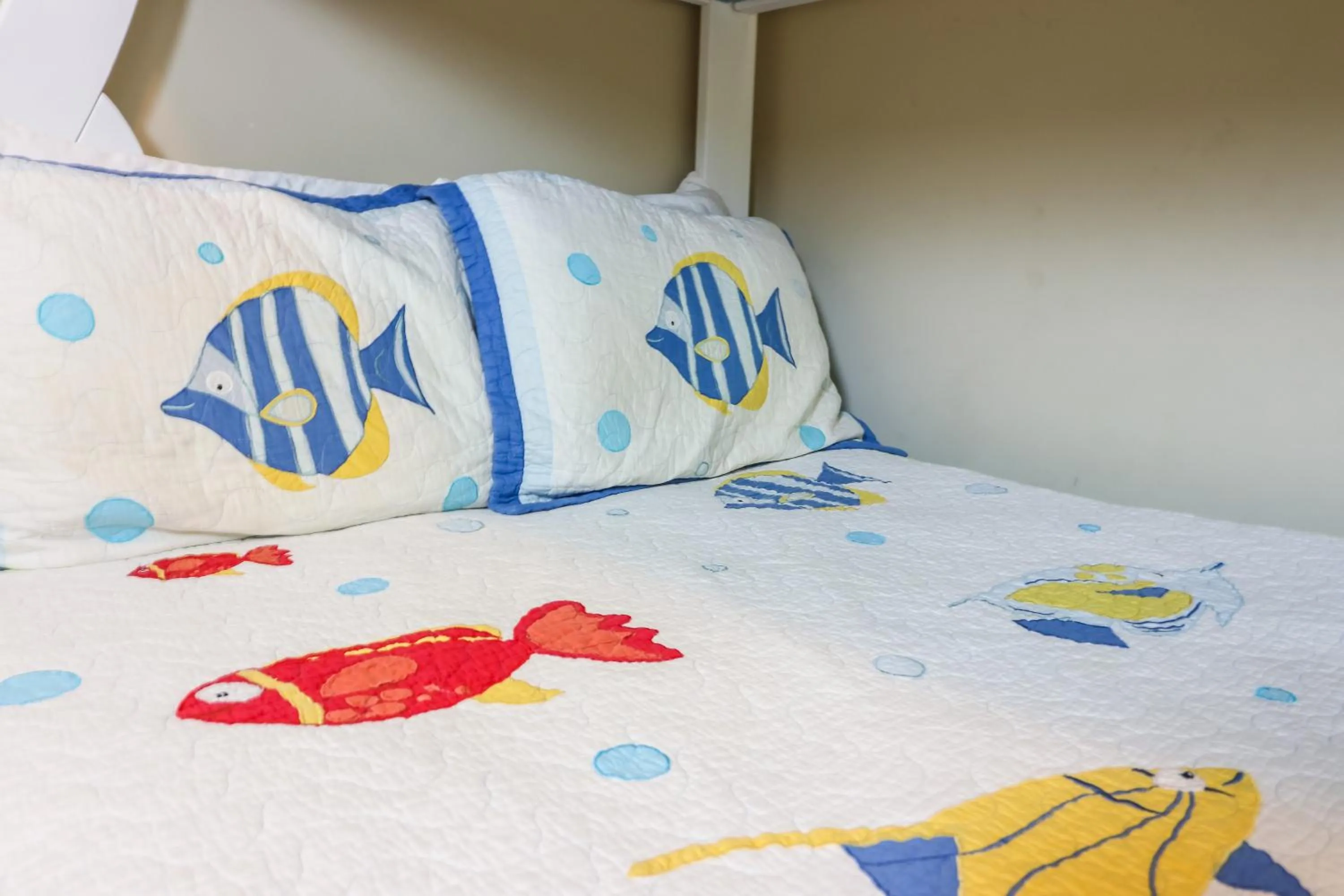 Bed in Beachfront Laid Back and Luxurious Diamond Beach Condo - Amazing Pools Amenities