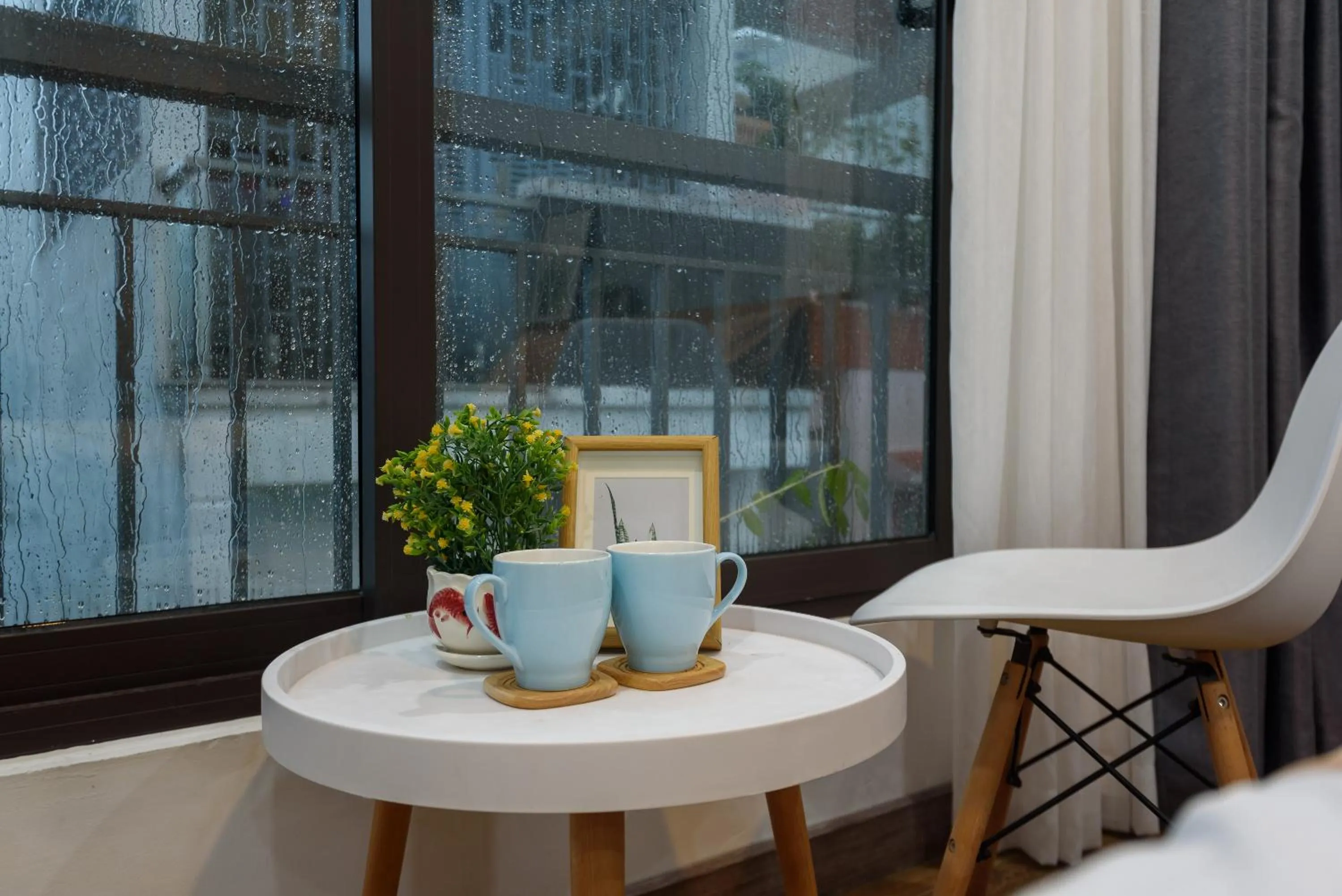 Dining area in Cozrum Homes - Graceful Corner