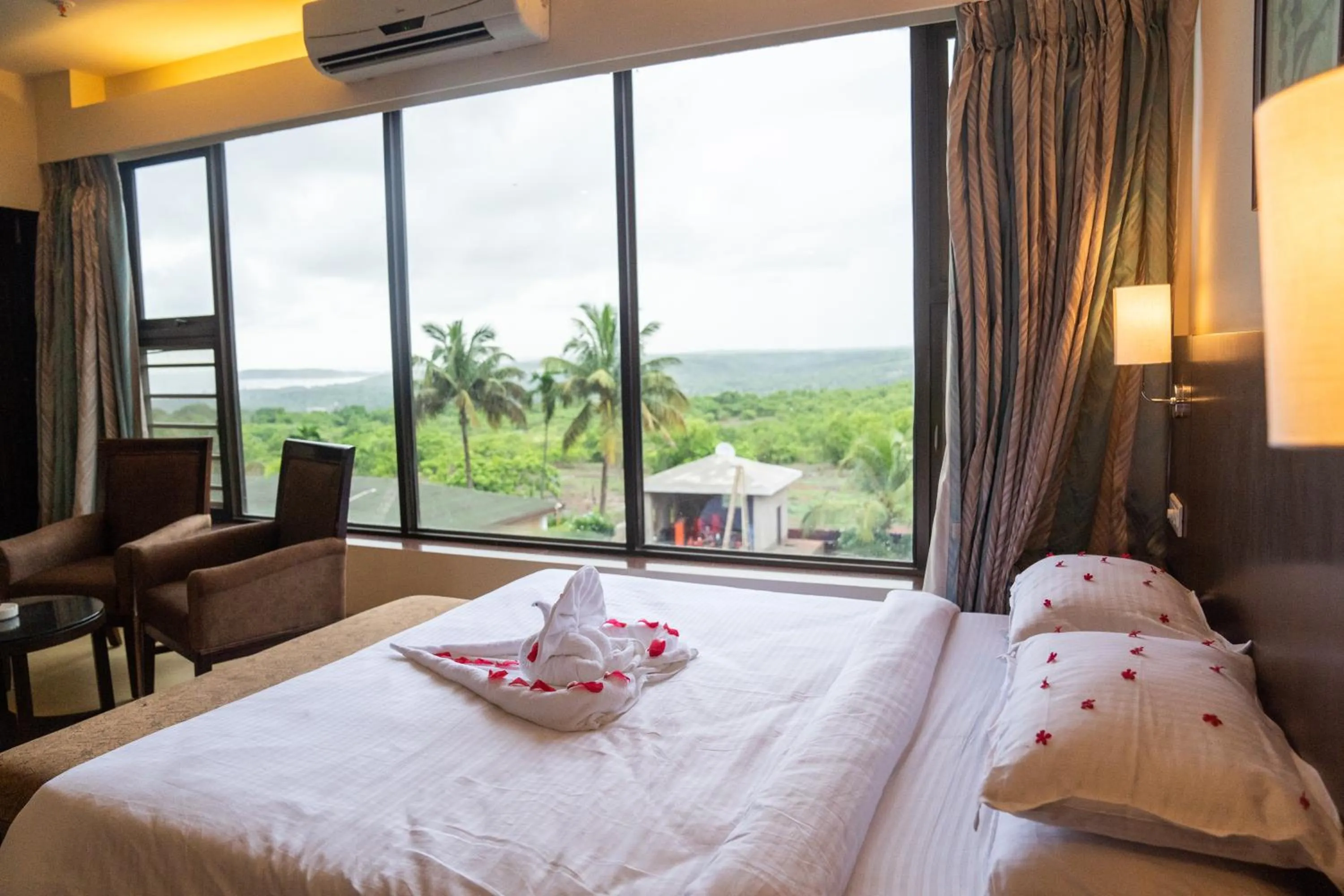 View (from property/room), Bed in Greenleaf The Resort & Spa, Ganpatipule