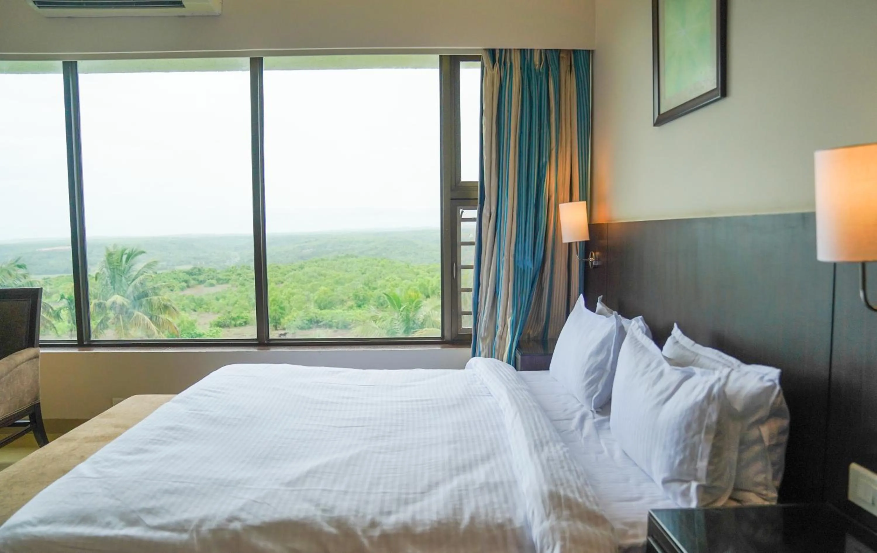 Bed in Greenleaf The Resort & Spa, Ganpatipule