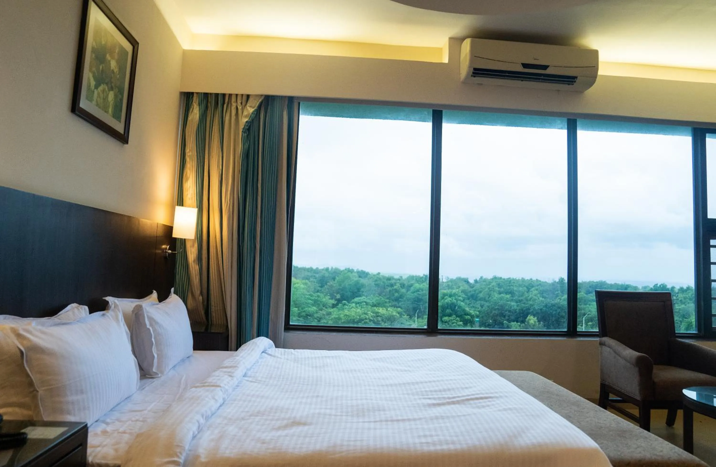 Bed in Greenleaf The Resort & Spa, Ganpatipule