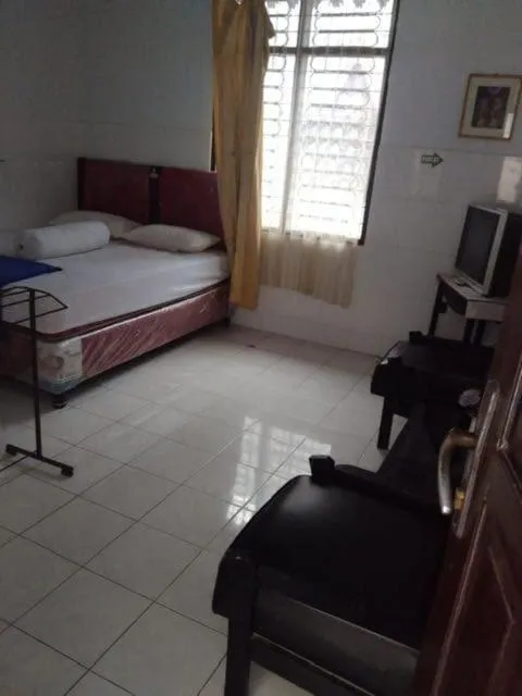 Bedroom, Bed in EXPRESS O 91176 Hotel Puri Gandaria