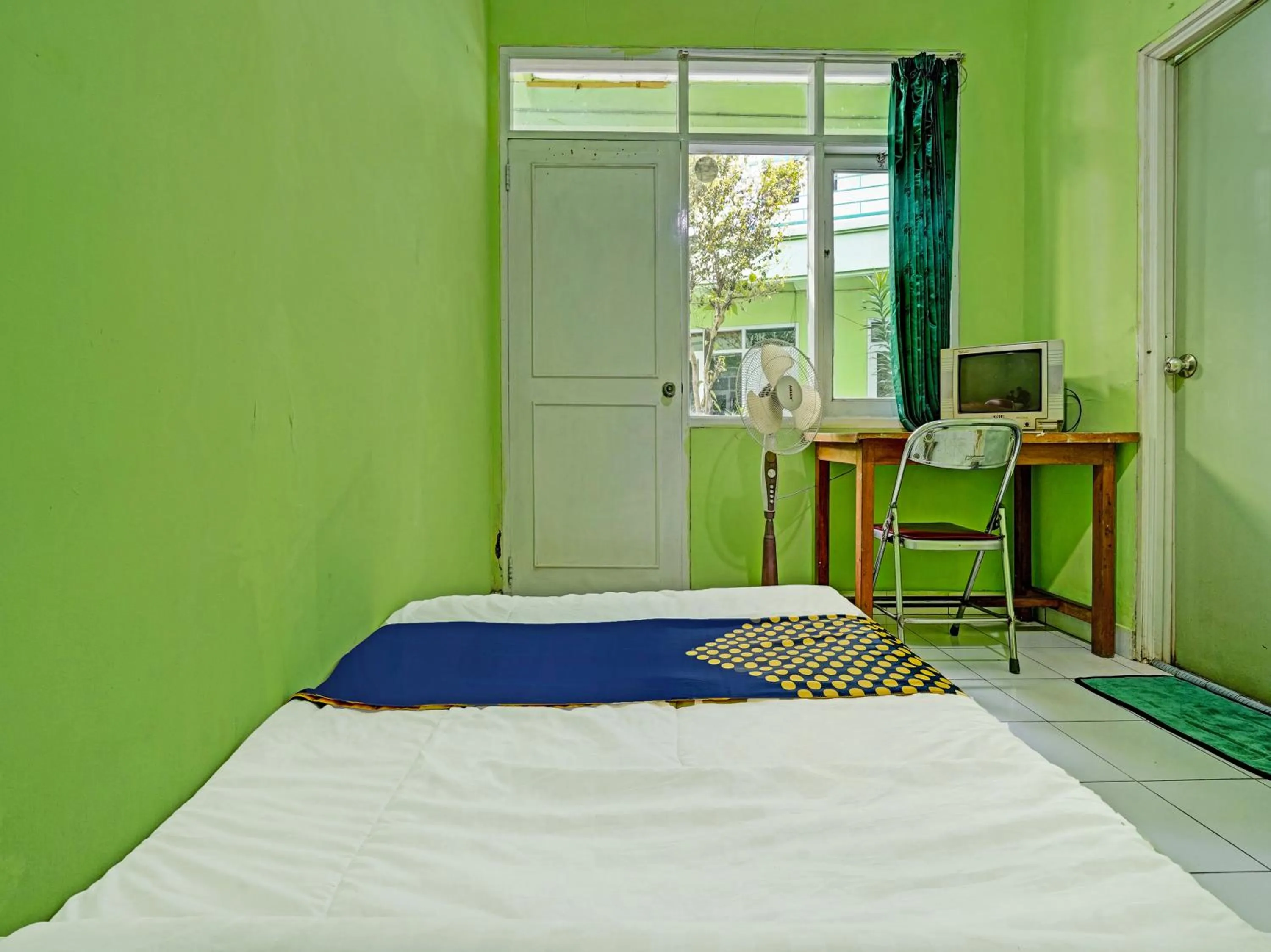 Bedroom in SPOT ON 91325 Pondok Hijau Guest House Syariah