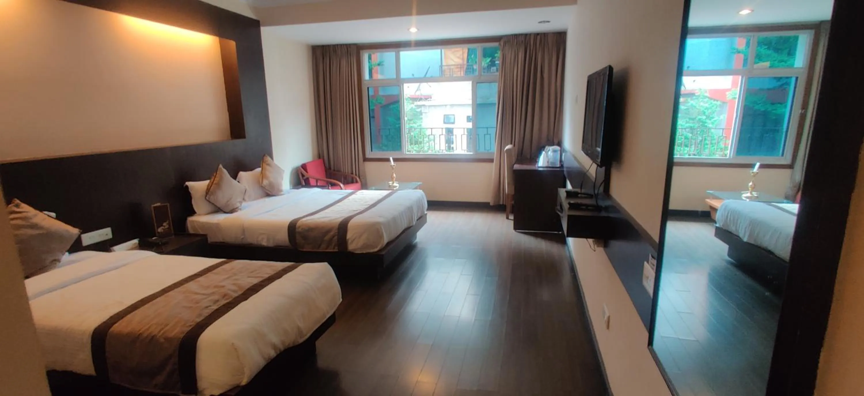 Bed in HOTEL RENDEZVOUS