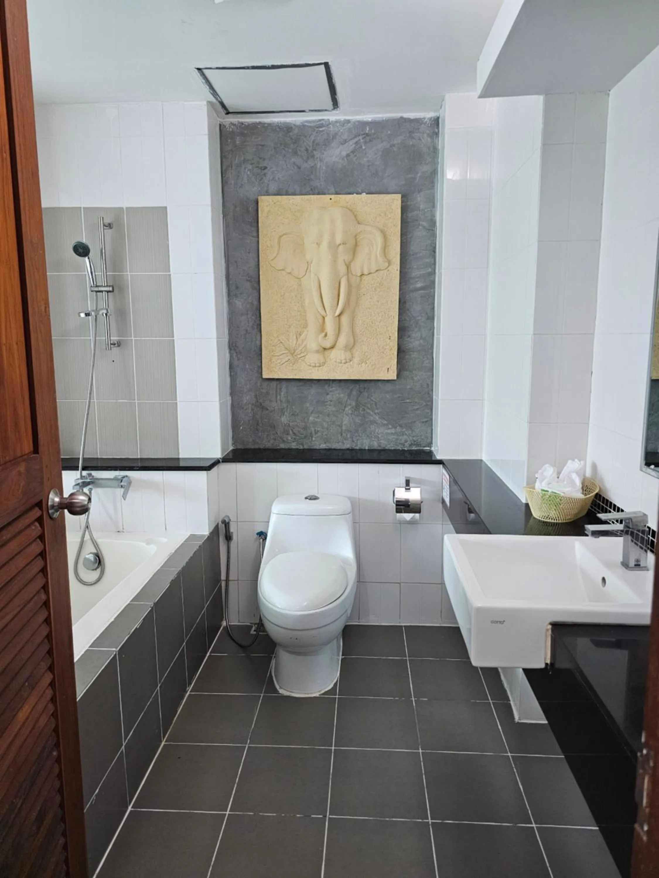 Bathroom in AM Surin Place - SHA Extra Plus
