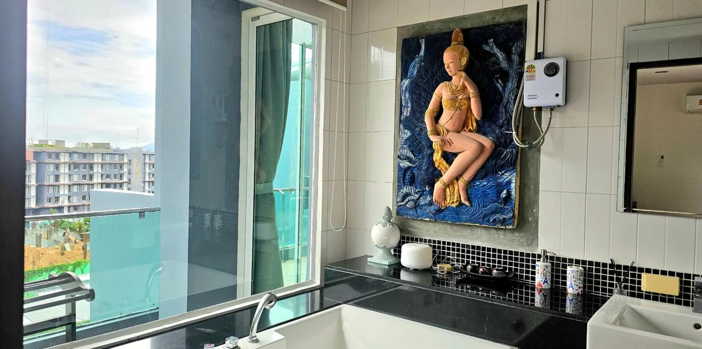 Bathroom in AM Surin Place - SHA Extra Plus