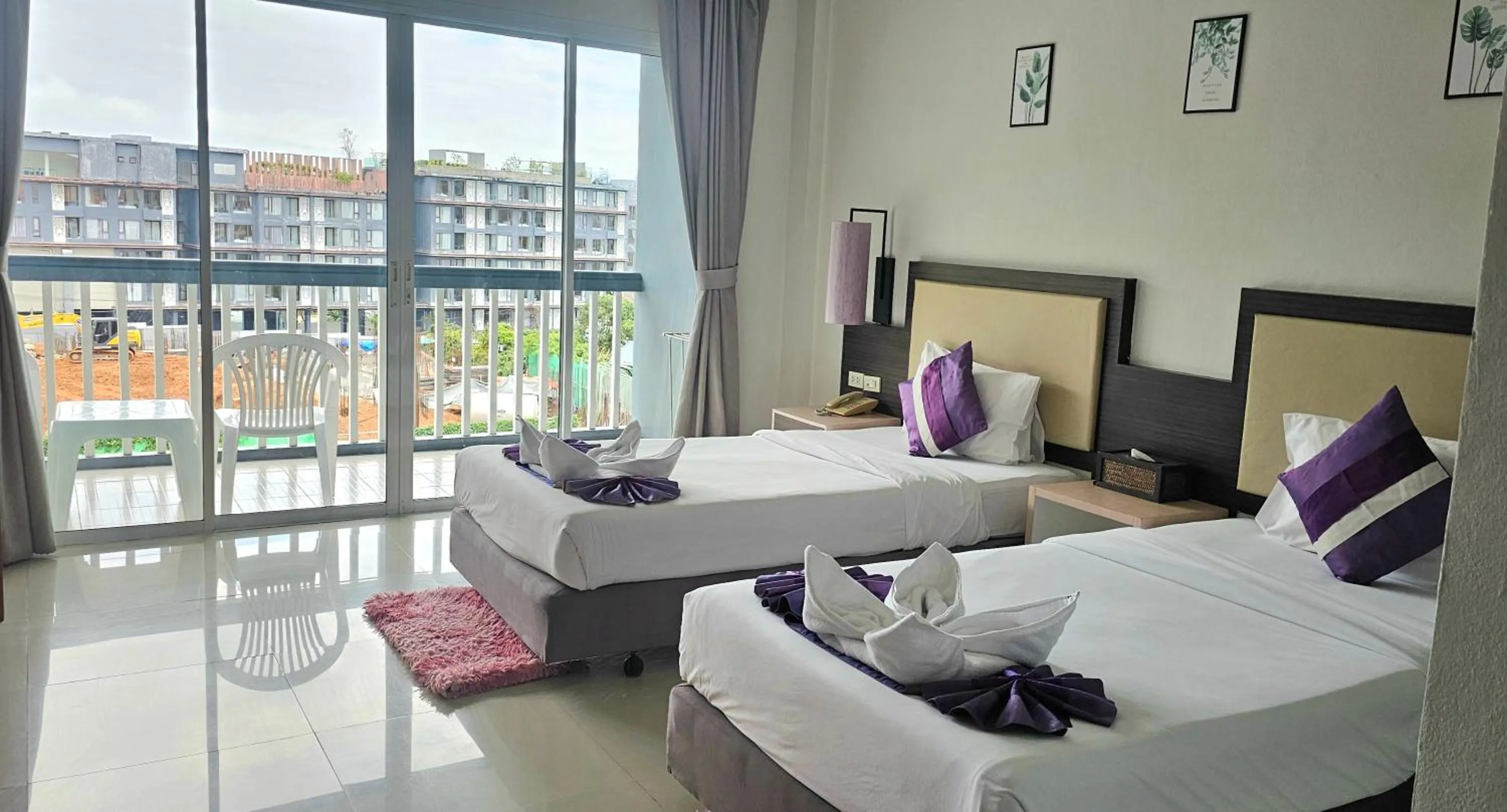 View (from property/room), Bed in AM Surin Place - SHA Extra Plus