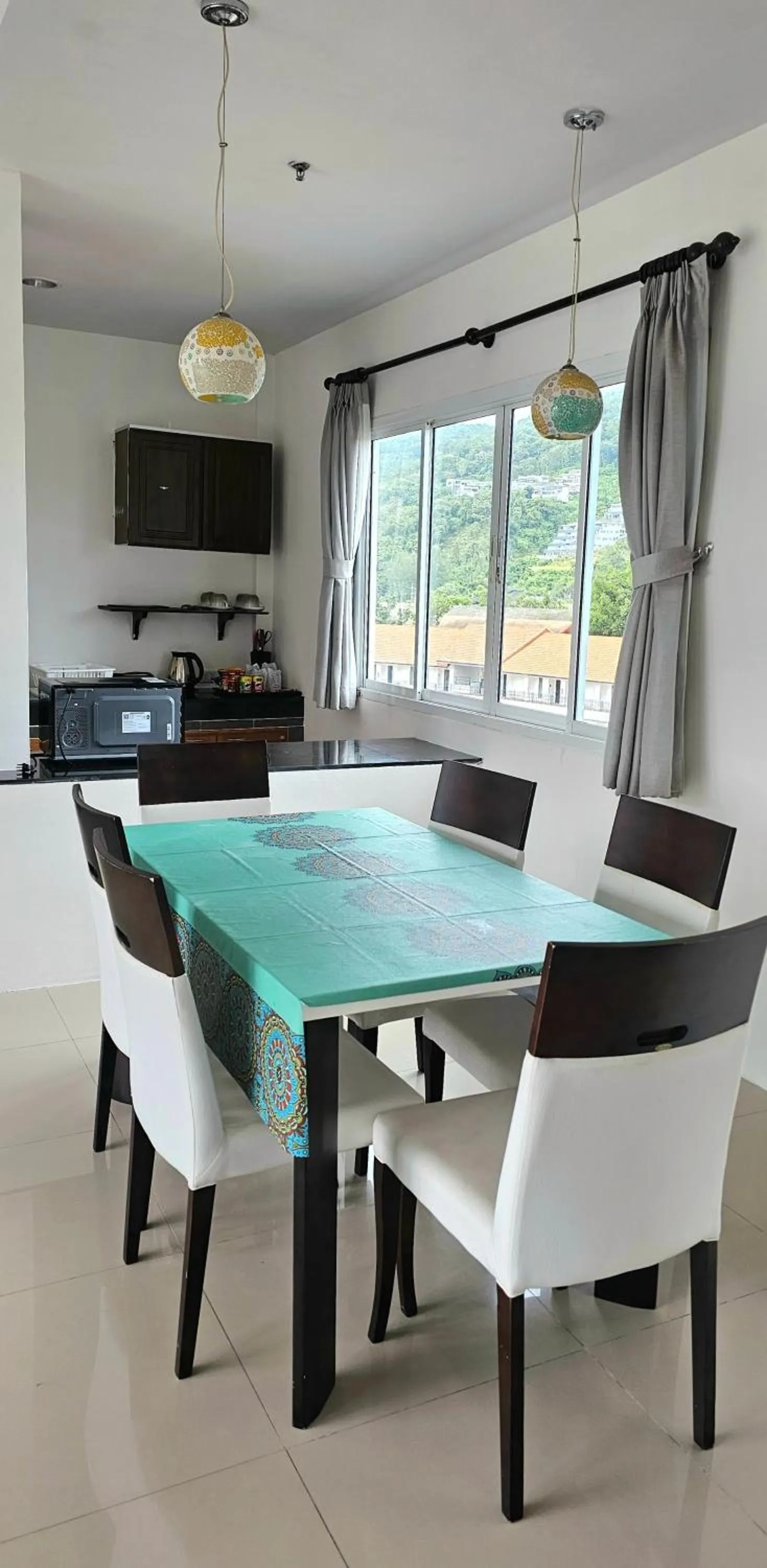 Kitchen or kitchenette in AM Surin Place - SHA Extra Plus